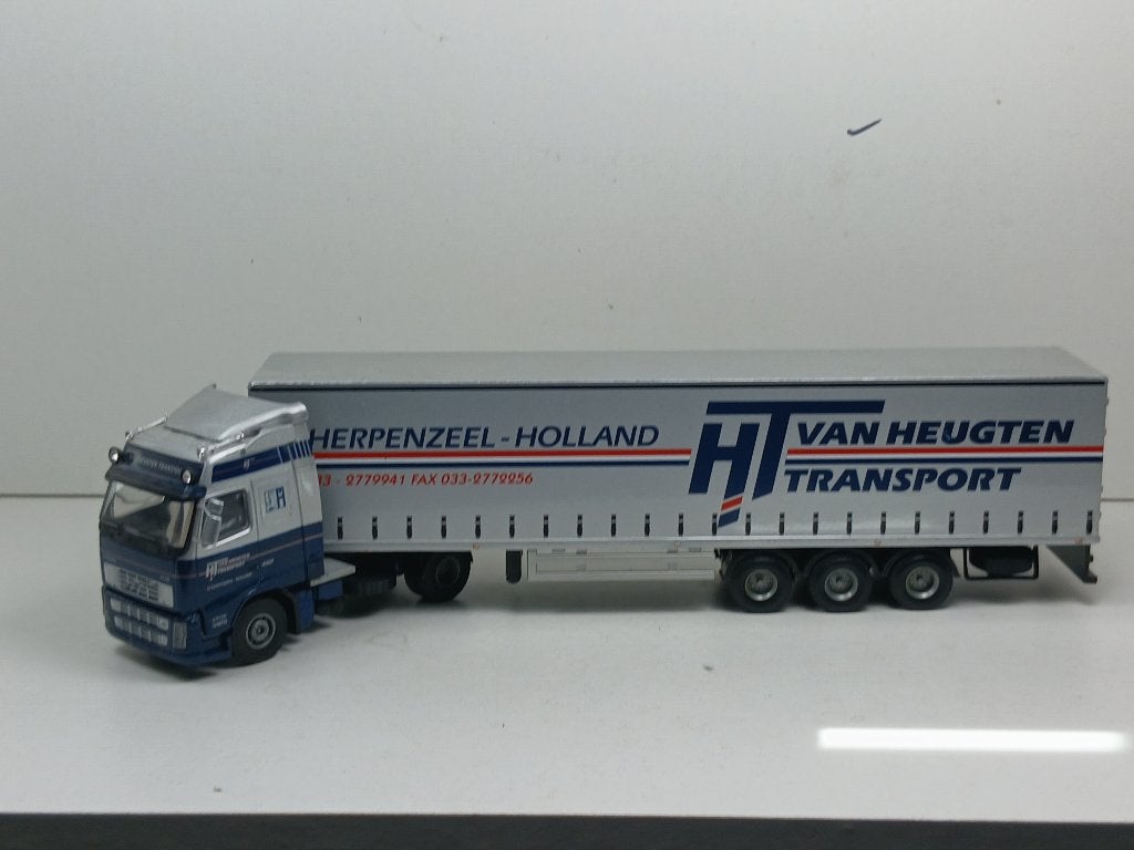 lion toys 1/50  volvo  ht van heugten transport, Hobby en Vrije tijd, Ophalen of Verzenden, Zo goed als nieuw, Bus of Vrachtwagen