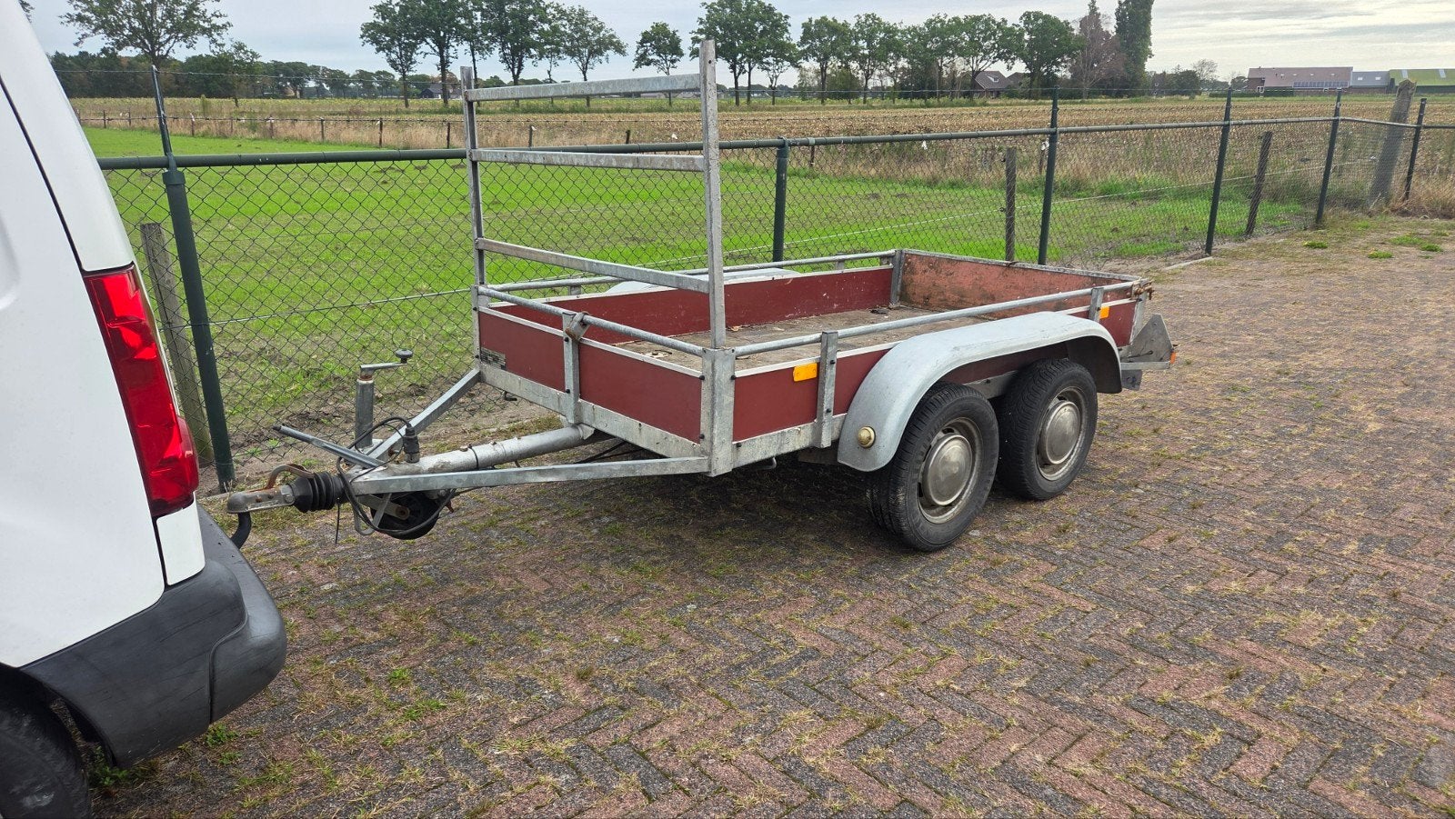 aanhanger dubbelasser, Ophalen
