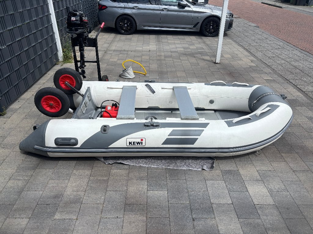 Kewi 330 rubberboot met alu bodem en 5 pk Suzuki kortstaart, Watersport en Boten, Aluminium, Gebruikt, 5 pk, Peddels