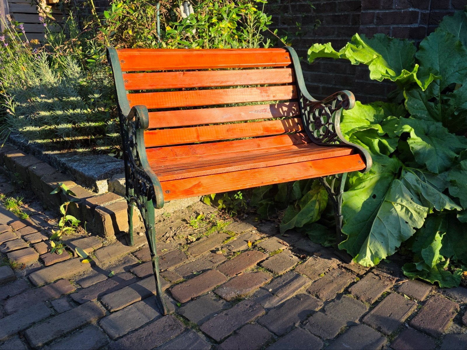 Tuinstoel met gietijzeren poten en houten latten, Tuin en Terras, Ophalen, Gebruikt, Hout