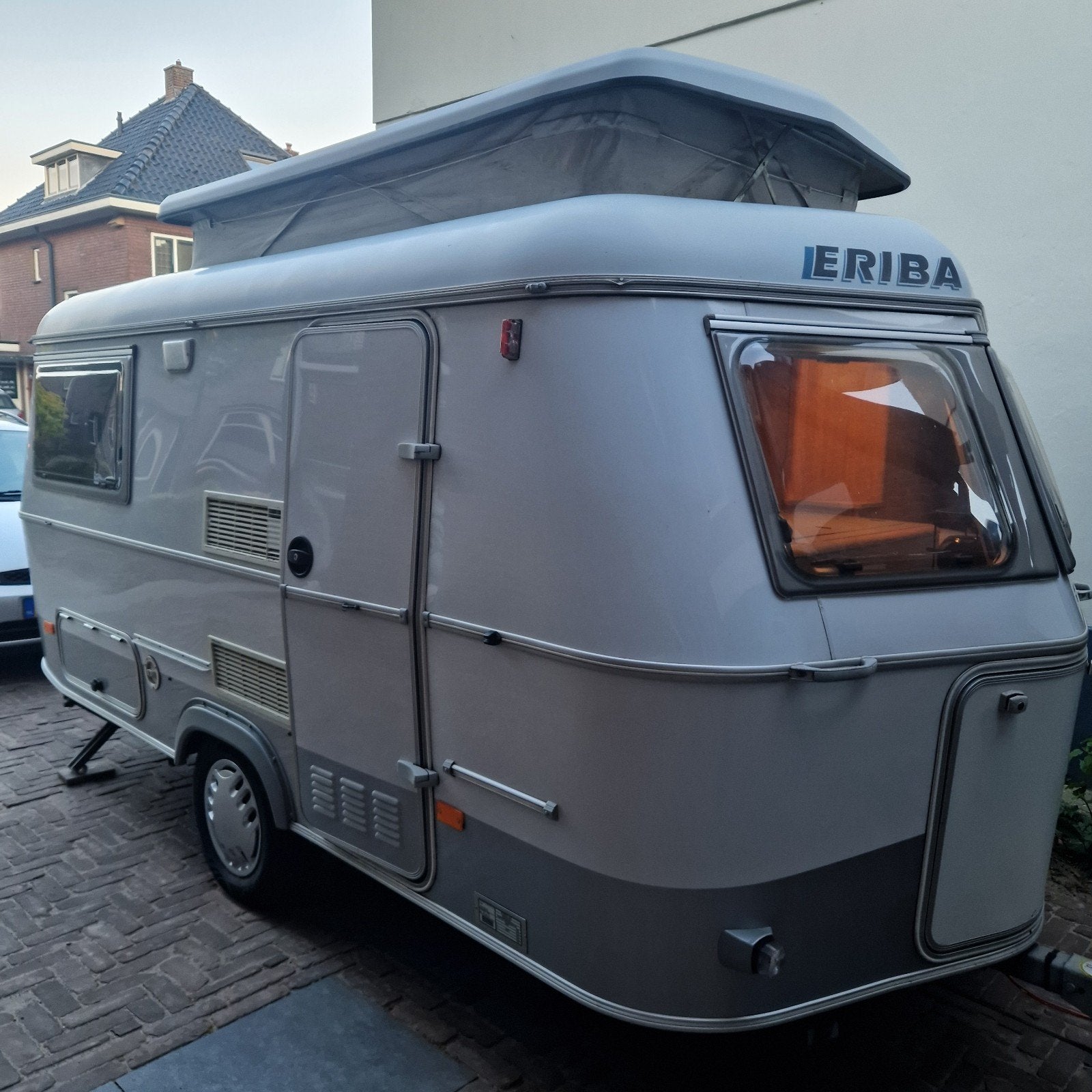 Compacte Eriba Touring Triton TM met hefdak en rondzit, Rondzit, Tot en met 2, Particulier, Luifel