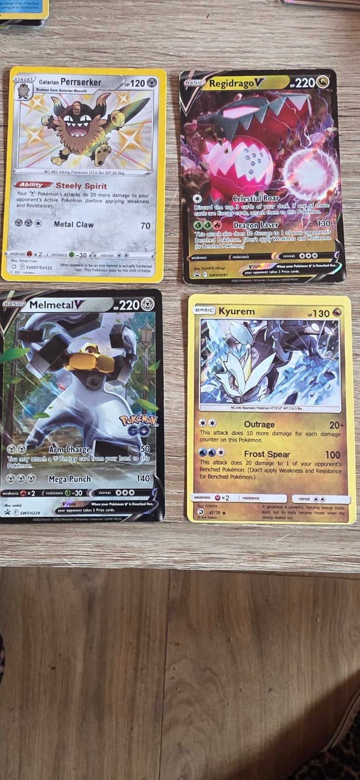 Pokémon  Galarian Perrserker, Regidrago V, Melmetal, Ophalen of Verzenden, Zo goed als nieuw, Meerdere kaarten, Foil