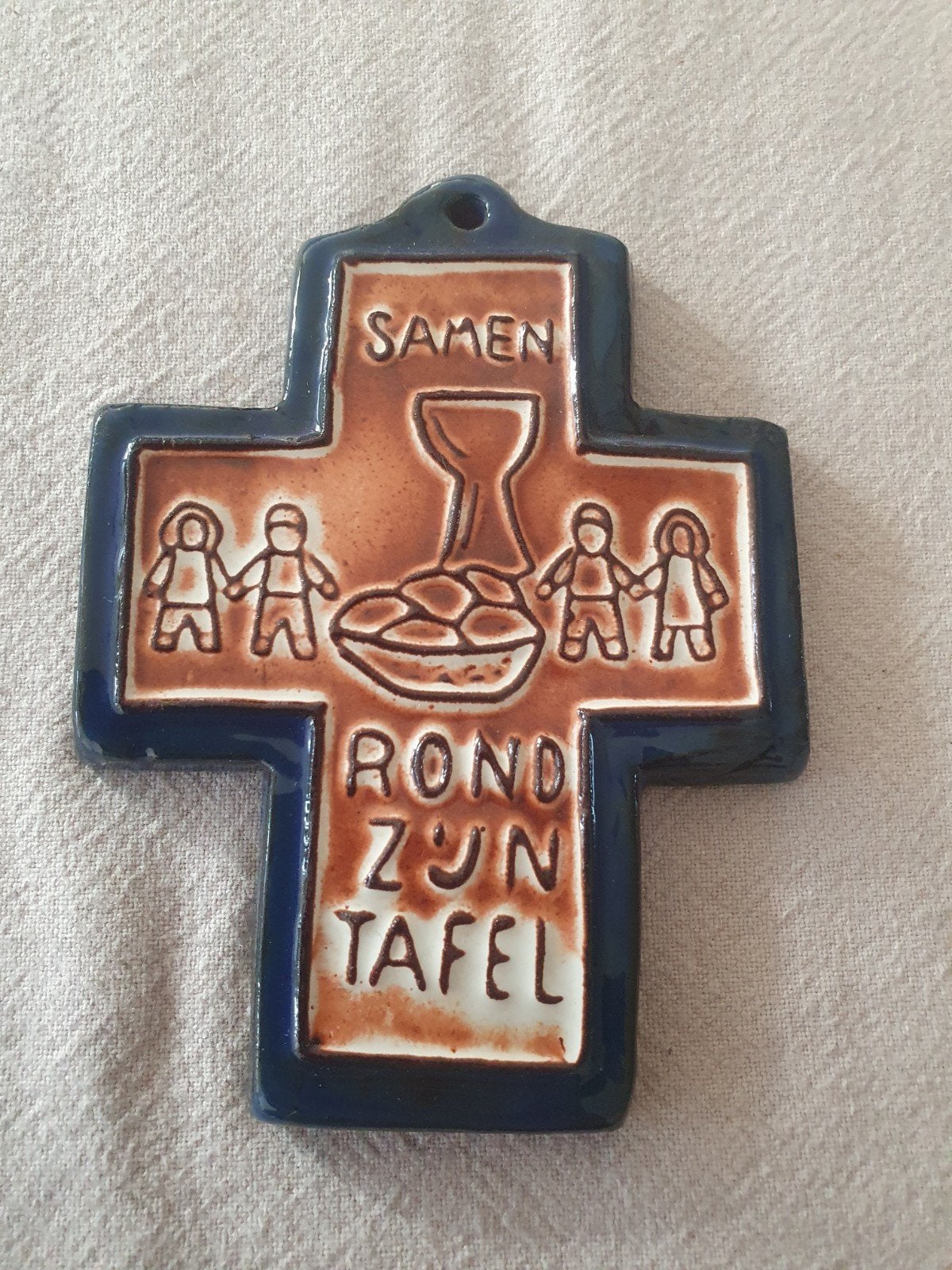 keramiek communiekruisje "Samen rond Zijn tafel" H. Potters, Ophalen