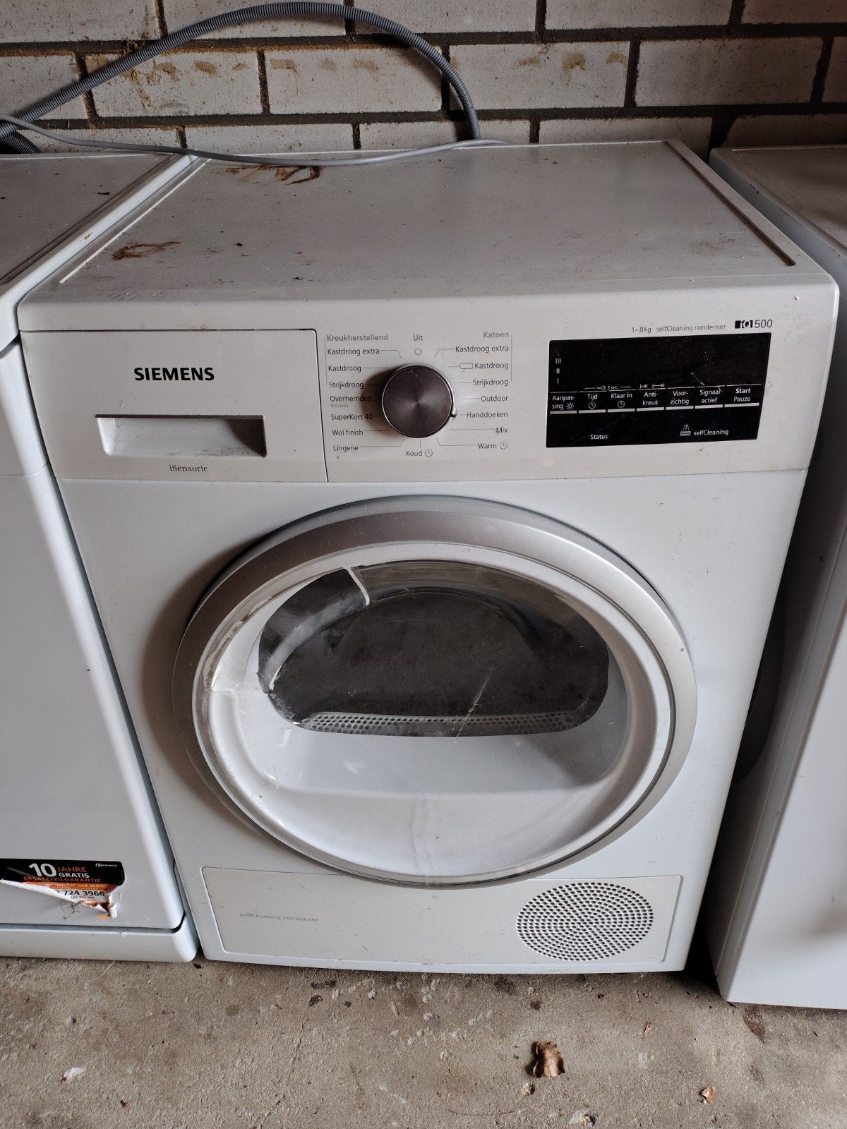 Siemens iQ500 droger - moet nagekeken/uitgezogen worden, Ophalen