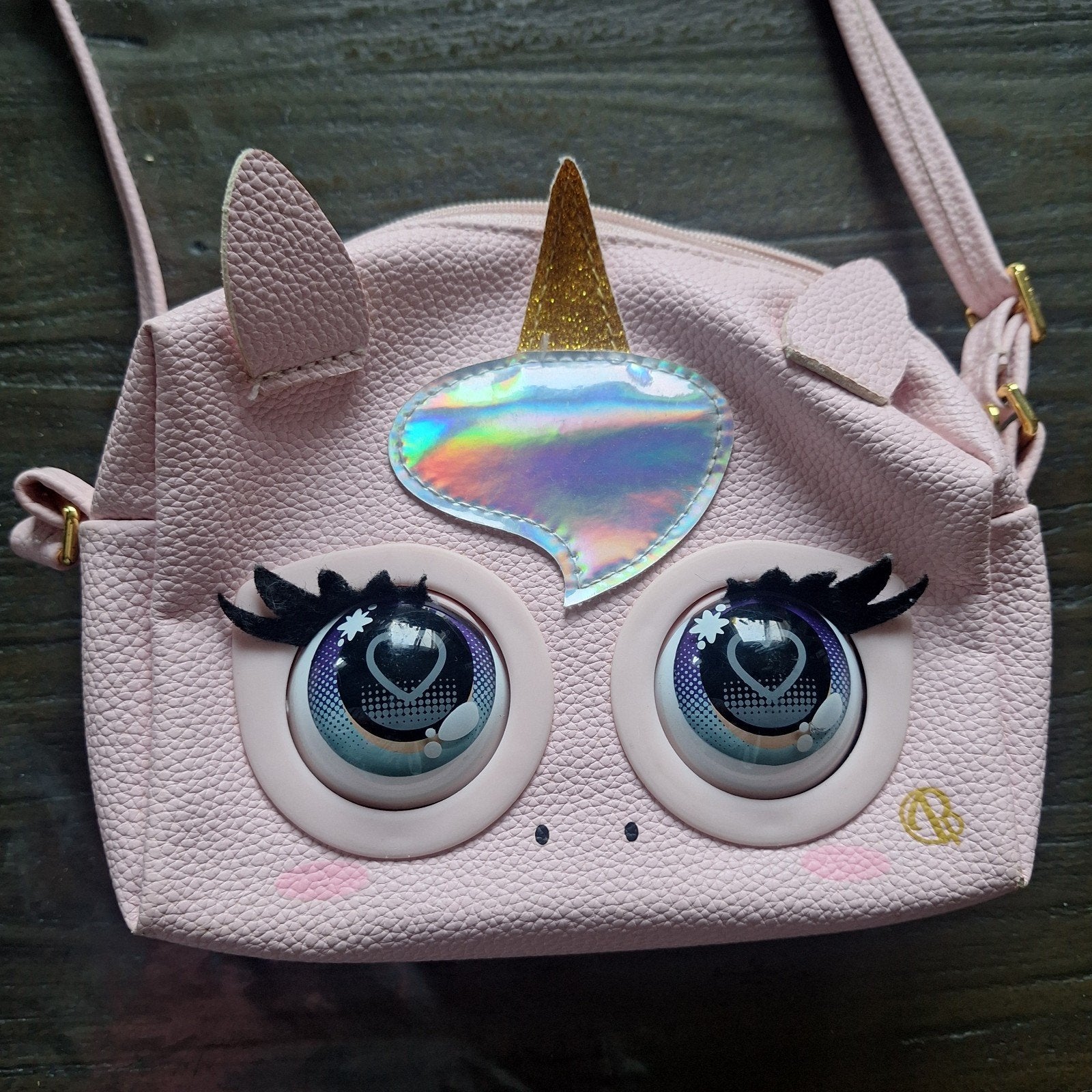 purse pet tas met knipperende ogen, Ophalen