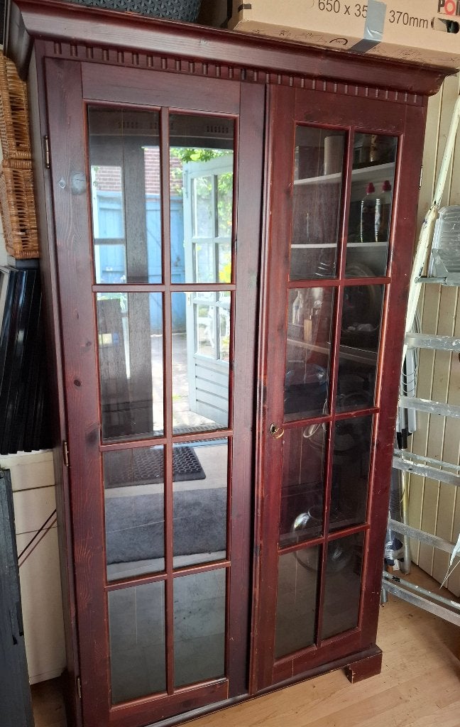 Mahoniehouten kast met glazen deuren, Ophalen
