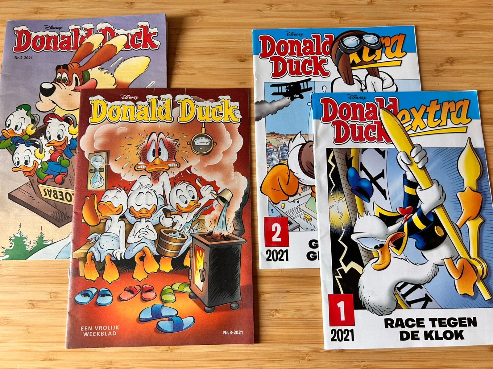 Donald Duck 2021 nummer 1 + nummer 2 + extra 2 exemplaren, Ophalen of Verzenden, Zo goed als nieuw, Overige typen