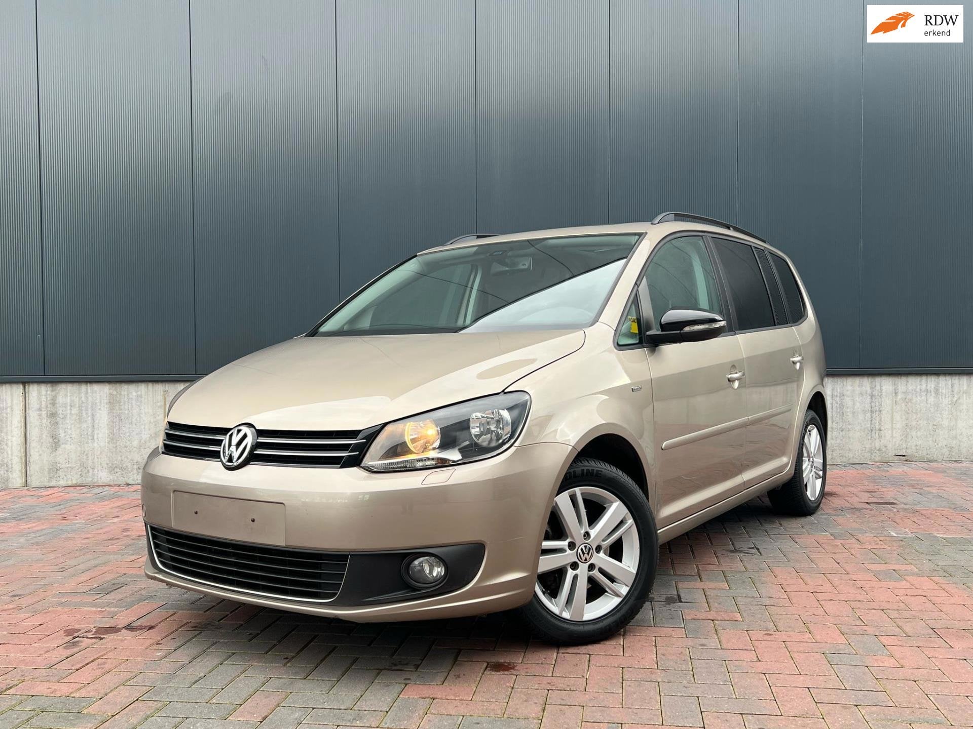 Volkswagen Touran 1.2 TSI Highline BlueMotion * Navi * Cruis, Gebruikt, Zwart, 4 cilinders, Origineel Nederlands