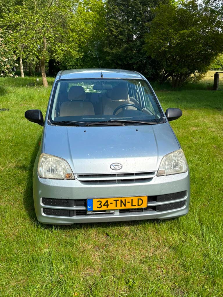 Daihatsu Cuore 1.0 5D 2006 Grijs met goedwerkende airco., Stof, 600 kg, Beige, 18 €/maand