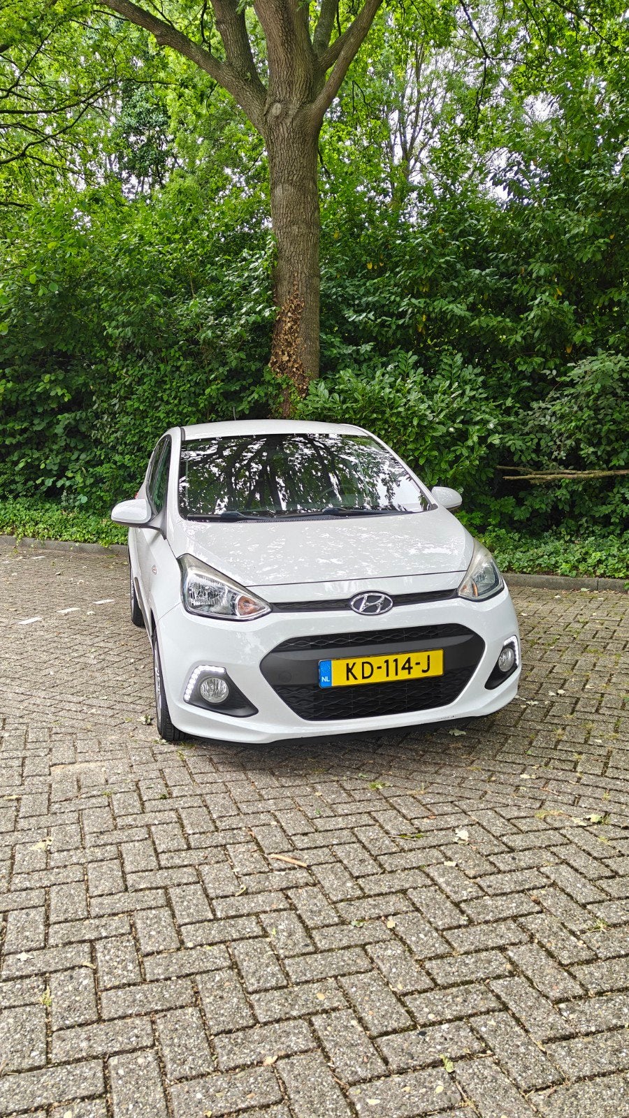 Hyundai i10 GO - 1.0i 66pk 2016 - wit, Auto's, Hyundai, Stof, 4 stoelen, Origineel Nederlands, Handgeschakeld