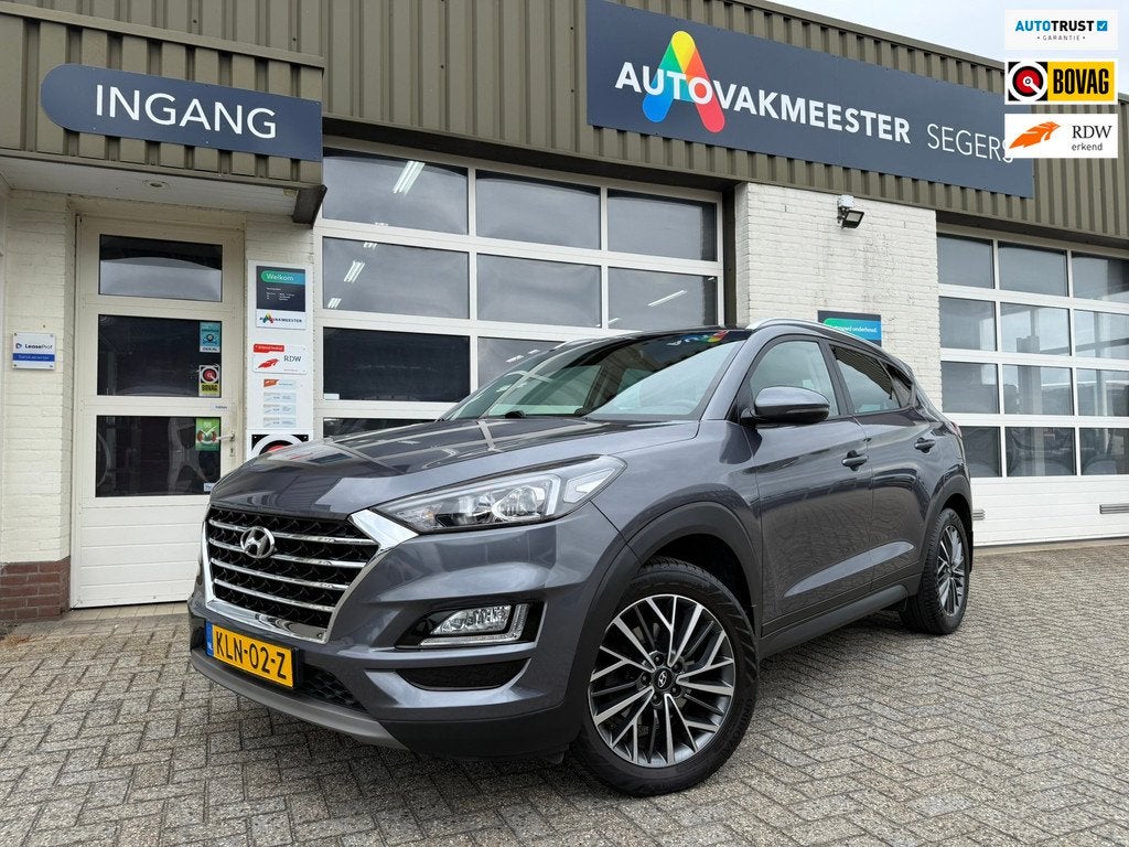 Hyundai TUCSON 1.6 T-GDI Comfort|Carplay|Trekhaak|, Auto's, Hyundai, Stof, Gebruikt, 4 cilinders, Bedrijf