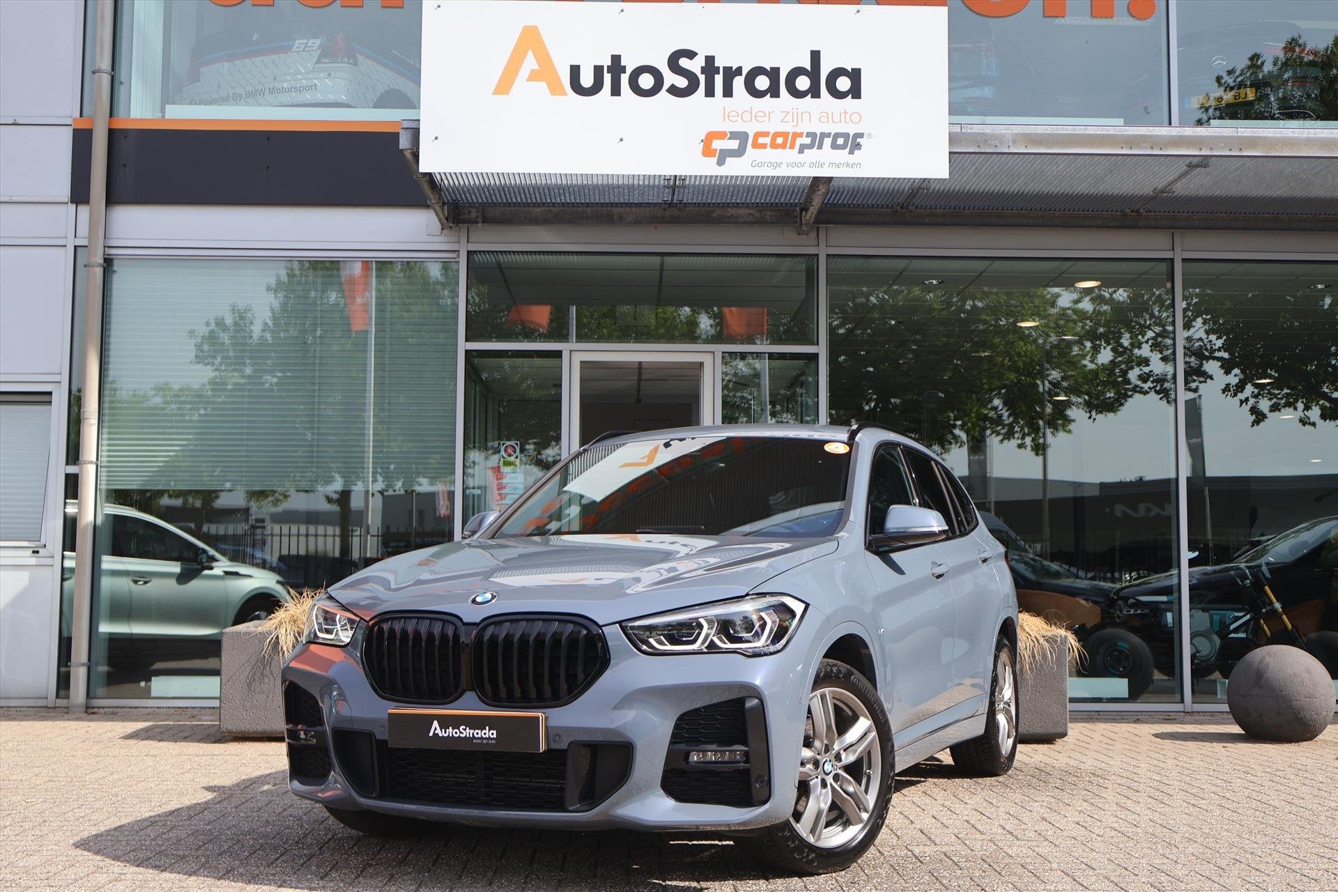 BMW X1 (f48) sDrive18i M-Sport | Stormbay | LED | Navigatie, Auto's, Gebruikt, Met garantie (alle), Regensensor, Leder en Stof