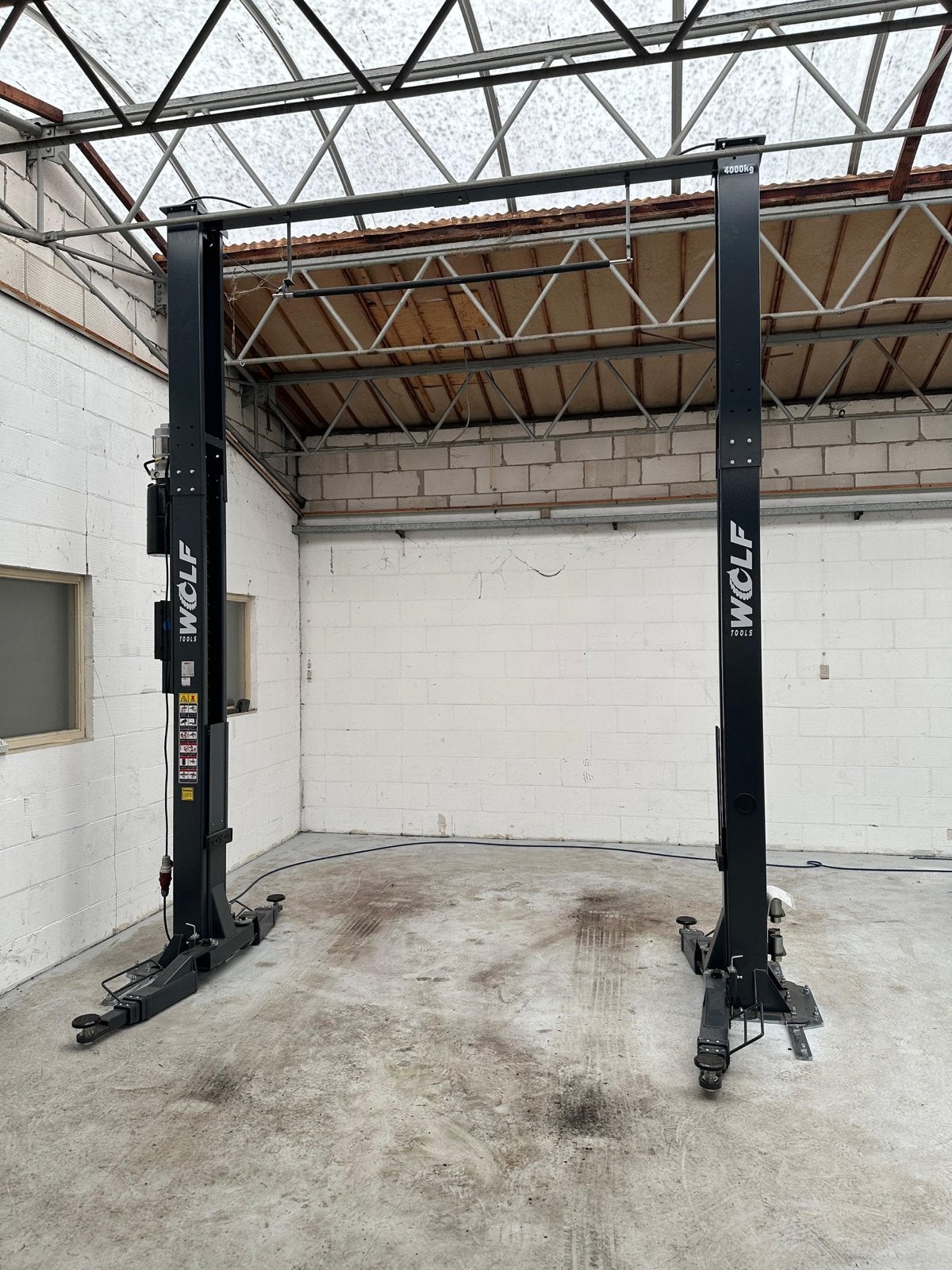 Wolf 2-koloms hefbrug 4000 kg Extra Hoog incl. vloerplaten, Auto diversen, Autogereedschap, Ophalen, Gebruikt