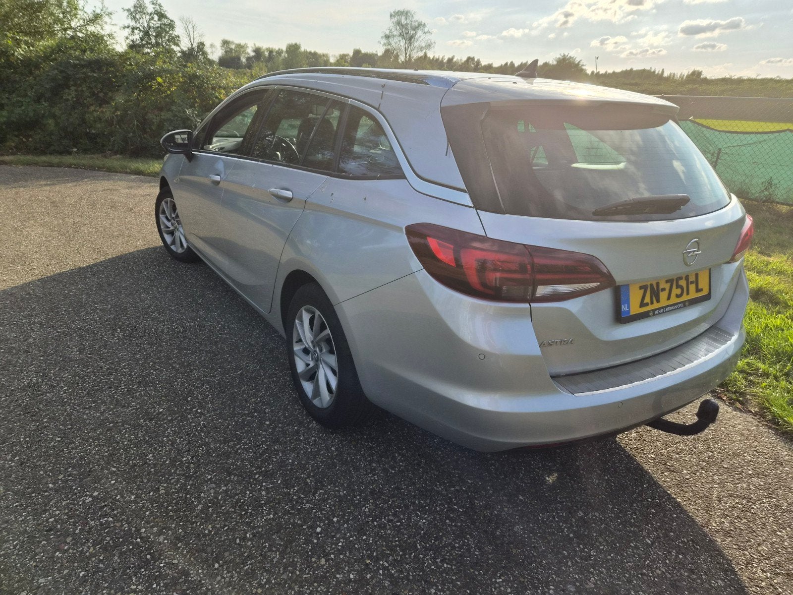 Opel Astra 1.4 Turbo 150pk Start/stop 2019 Grijs +trekhaak, Auto's, Voorwielaandrijving, 15 km/l, Origineel Nederlands, Stationwagon