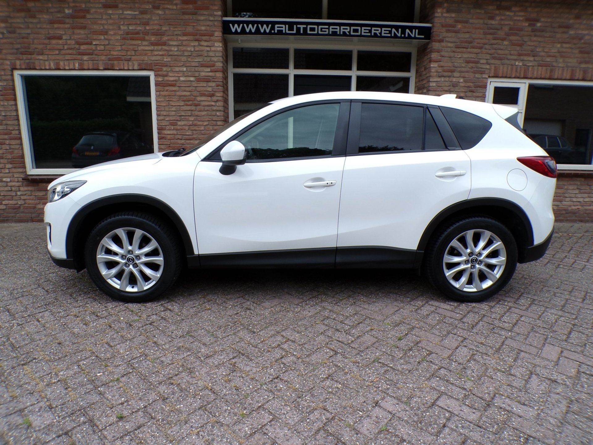 Mazda CX-5 2.0 GT-M 4WD Automaat / Leder / Navi / Trekhaak, Automaat, Zwart, 4 cilinders, Wit
