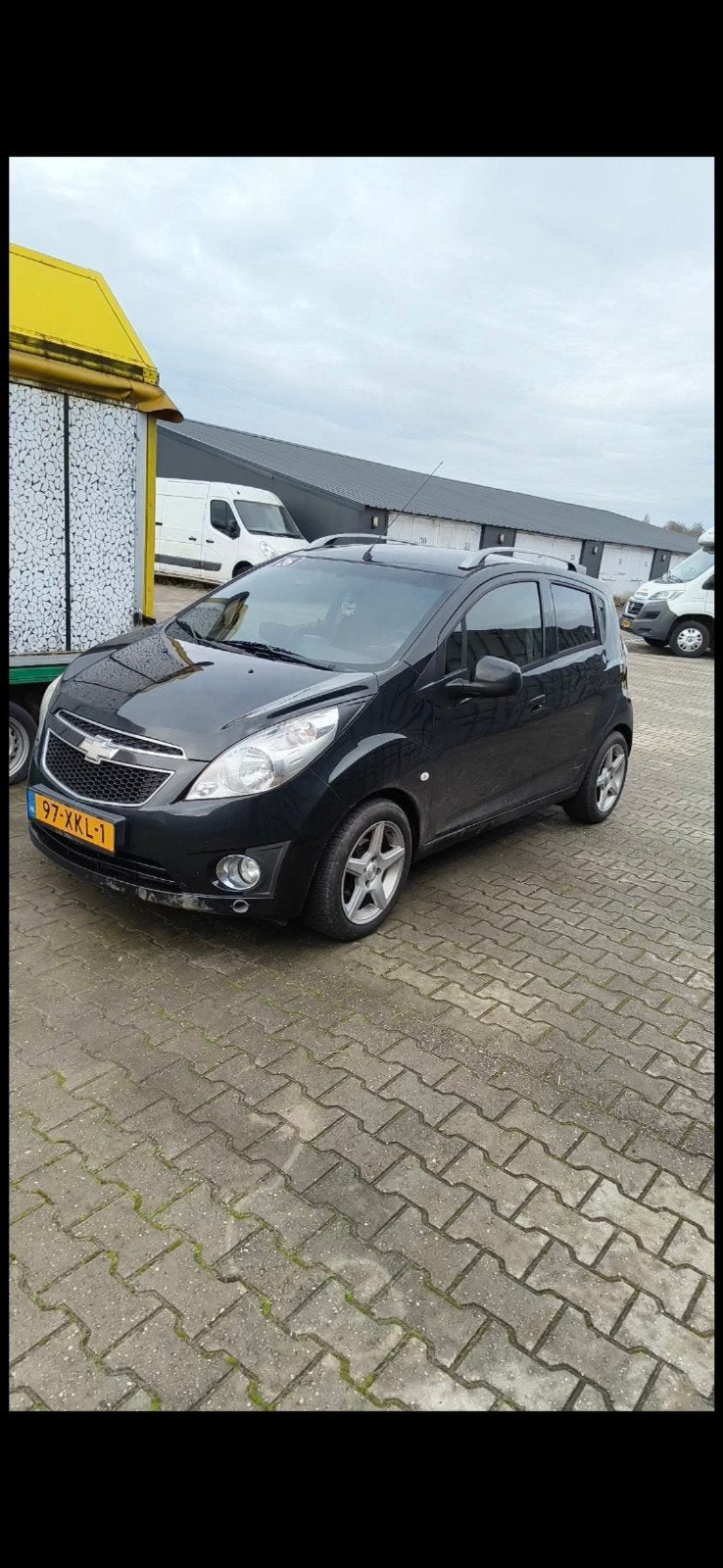 Chevrolet Spark 1.0 Bifuel 2012 Zwart cruise control, 15 km/l, 37 €/maand, 4 cilinders, Zwart
