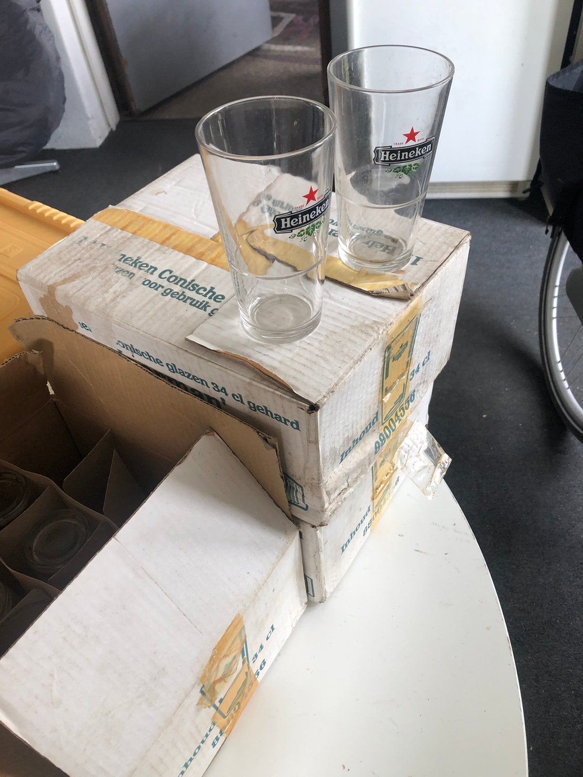 34 Heineken glazen, Ophalen of Verzenden, Zo goed als nieuw, Bierglas