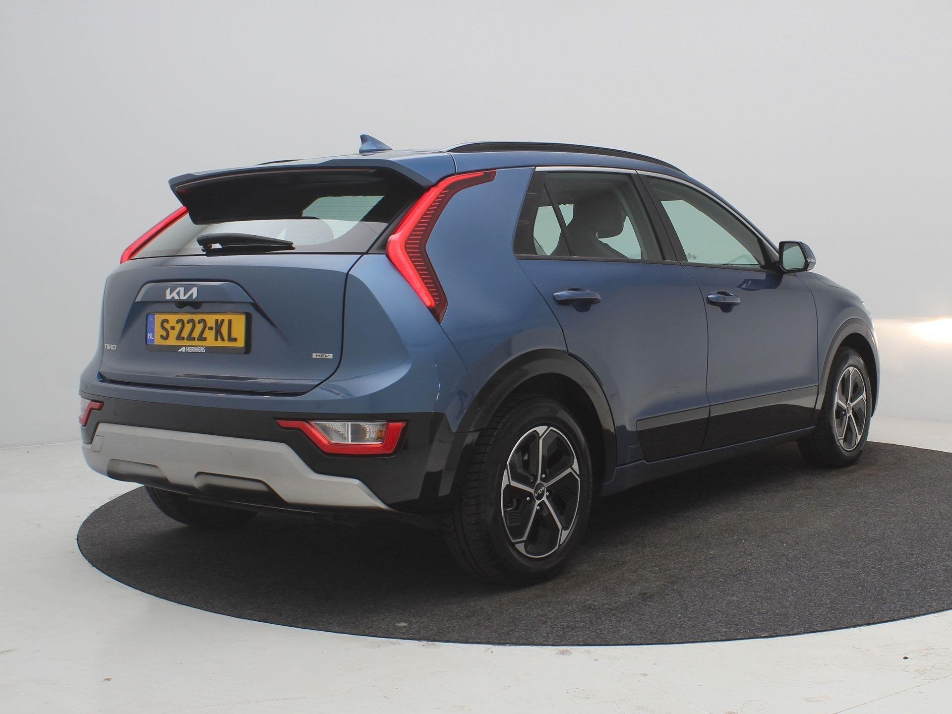 Kia Niro 1.6 GDi Hybrid DynamicLine / Automaat / Navigatie /, Auto's, Kia, 1374 kg, Gebruikt, Blauw, Leder en Stof