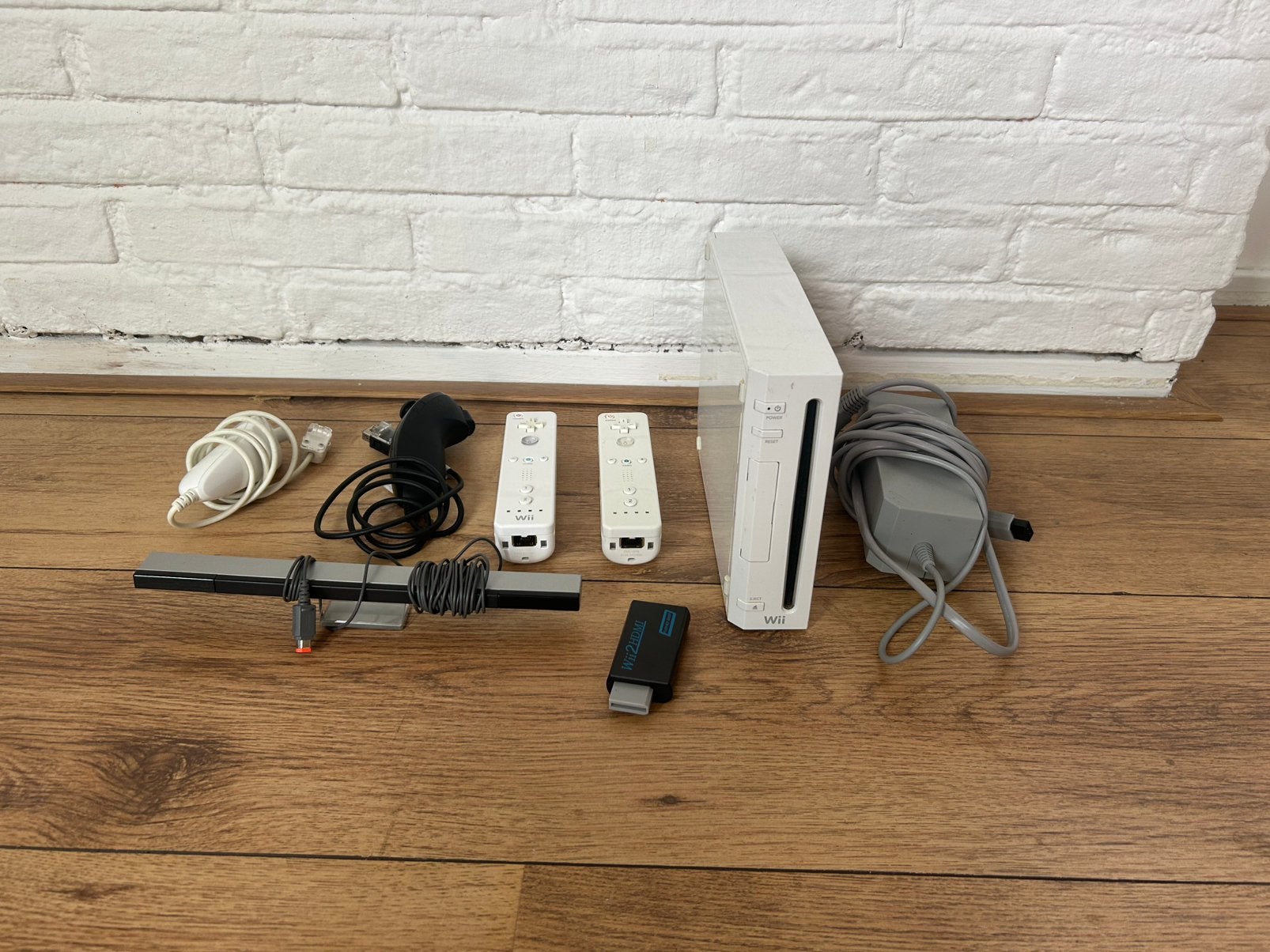 Nintendo Wii + 52 spellen, Ophalen of Verzenden, Zo goed als nieuw, Met 2 controllers, Met games