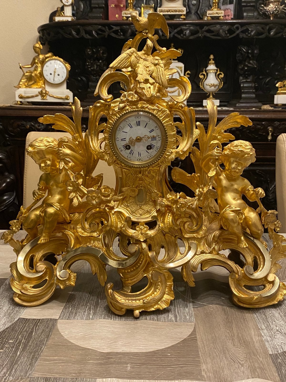 Antieke Franse bronzen klok met cherubijnen en vogels, Antiek en Kunst, Antiek | Klokken, Ophalen of Verzenden
