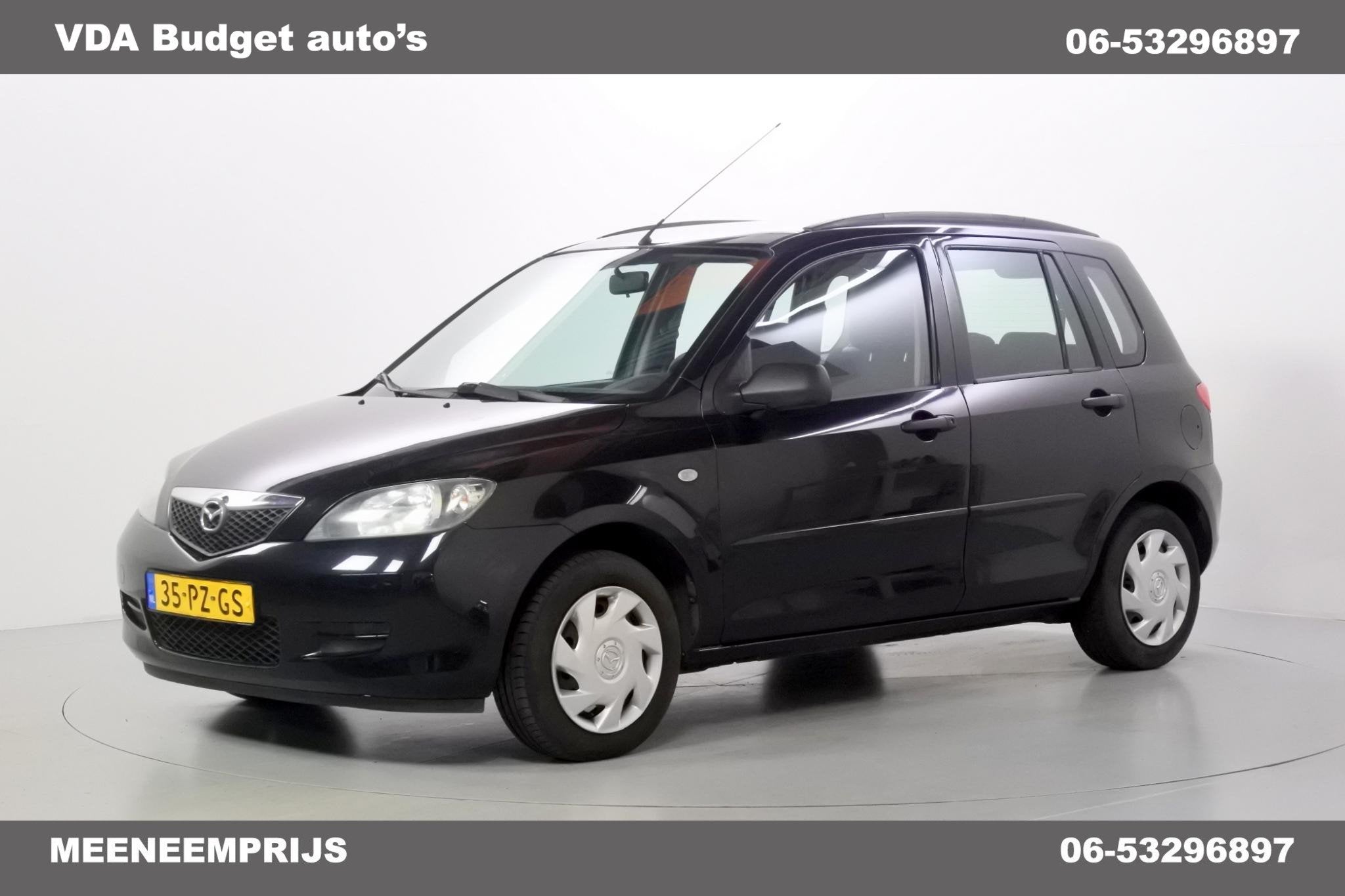 Mazda 2 1.4 APK 10-2027 Exclusive, Auto's, Voorwielaandrijving, 4 cilinders, Zwart, Origineel Nederlands