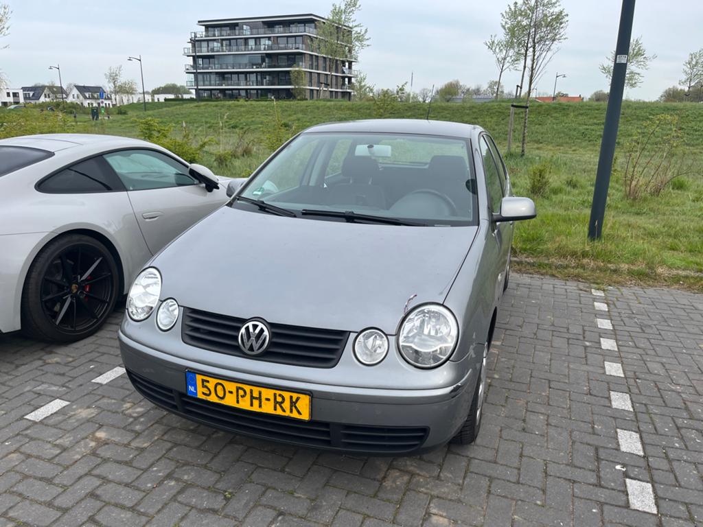 Volkswagen Polo 1.4 55KW 2004 apk 2027, Voorwielaandrijving, 4 cilinders, Handgeschakeld, Grijs