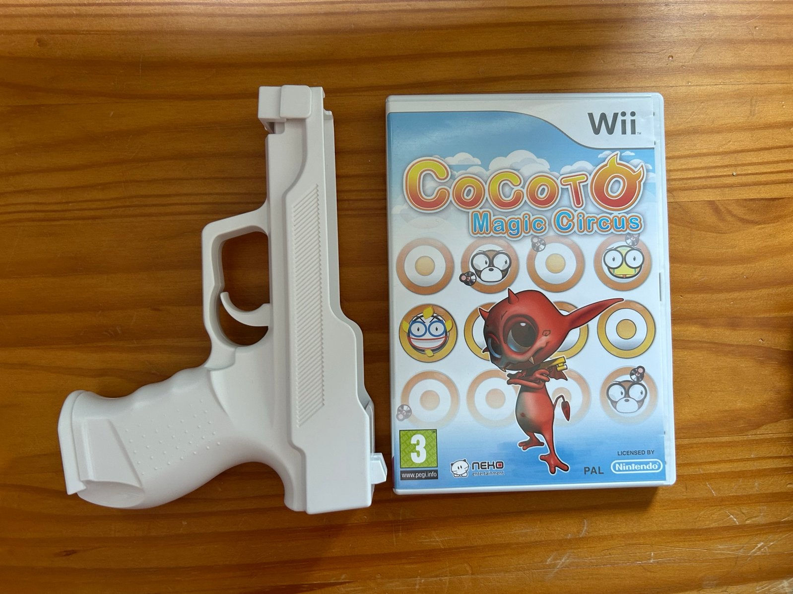 Cocoto Magic Circus Wii met Wii Zapper, Spelcomputers en Games, Games | Nintendo Wii, Gebruikt, Shooter, 1 speler, Ophalen of Verzenden