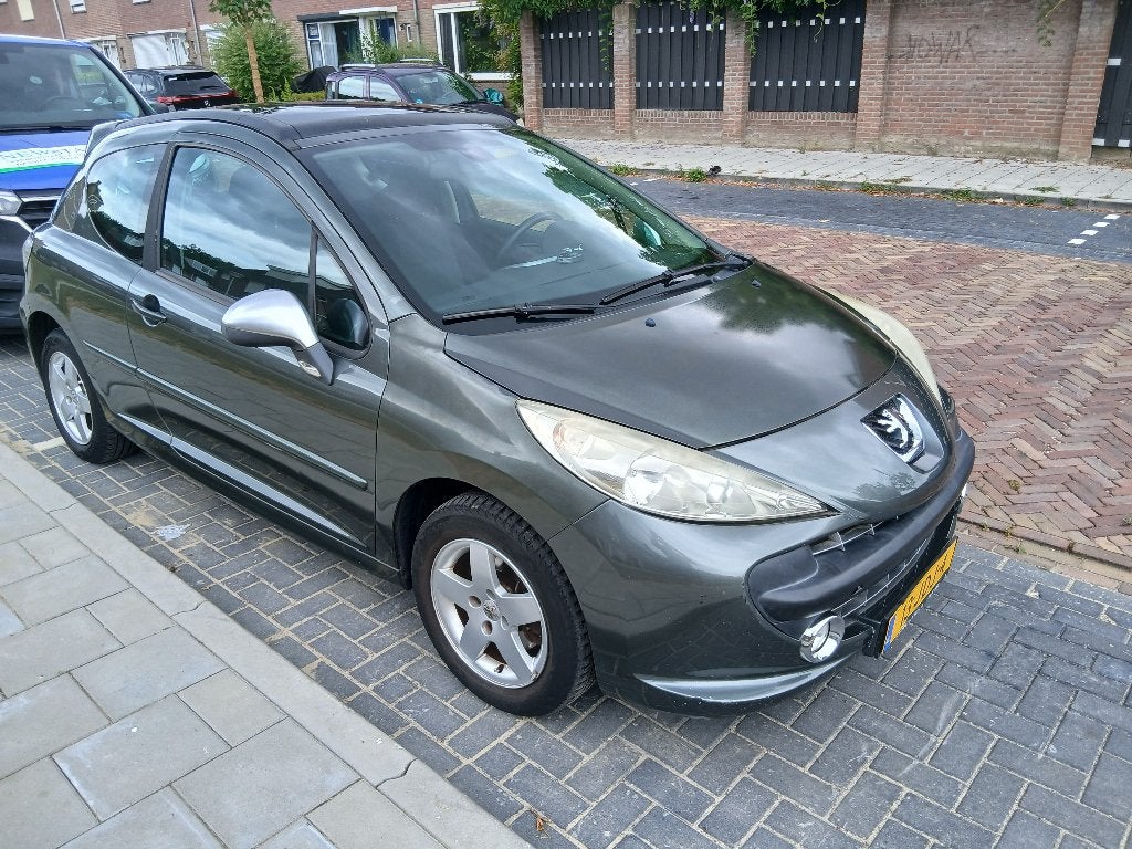 Peugeot 207 1.4 VTI 16V 3DRS 2009 Grijs, Auto's, Voorwielaandrijving, Stof, 49 €/maand, Origineel Nederlands