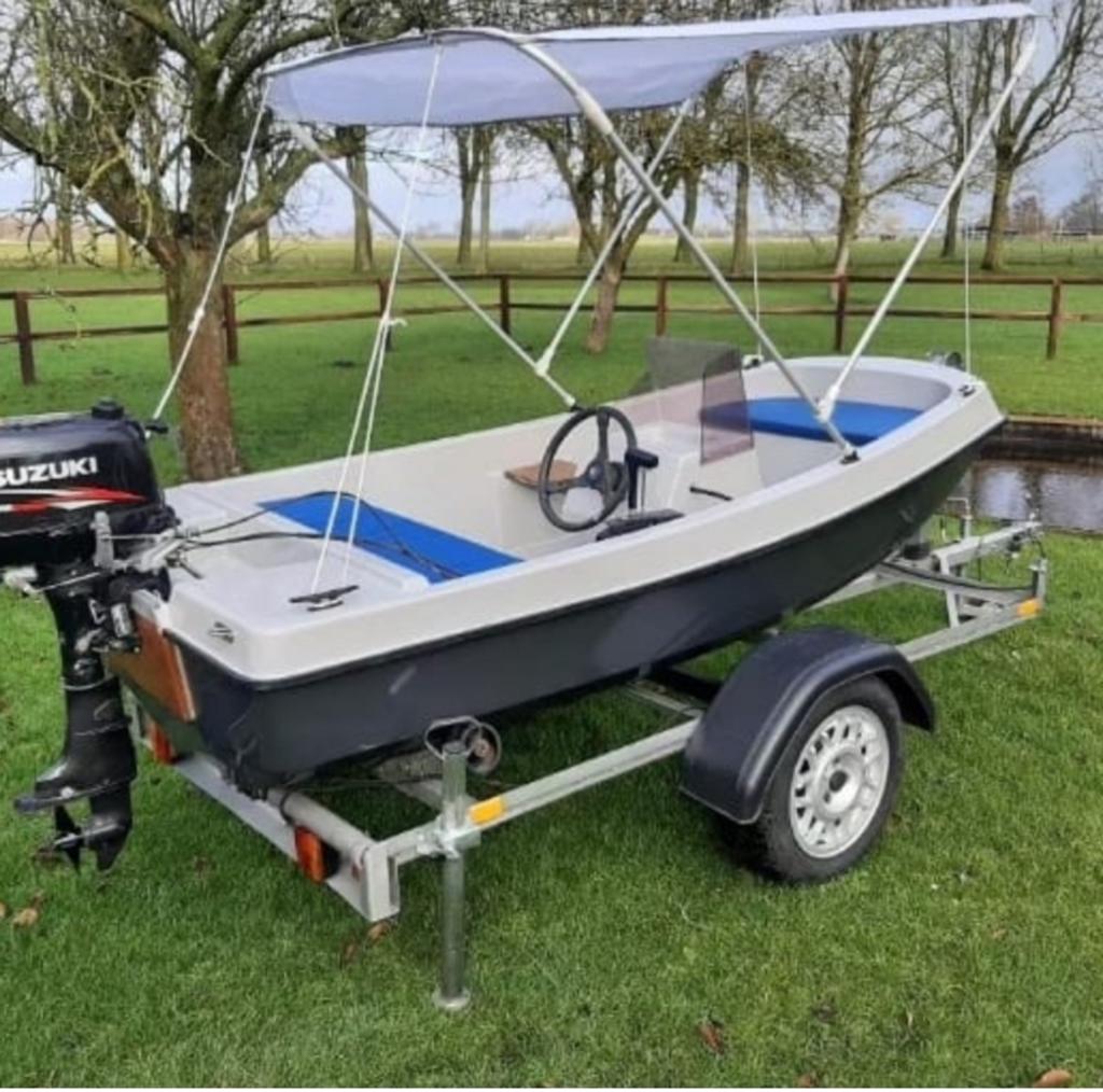 Console boot met trailer en Suzuki buitenboordmotor, Watersport en Boten, Ophalen, Gebruikt