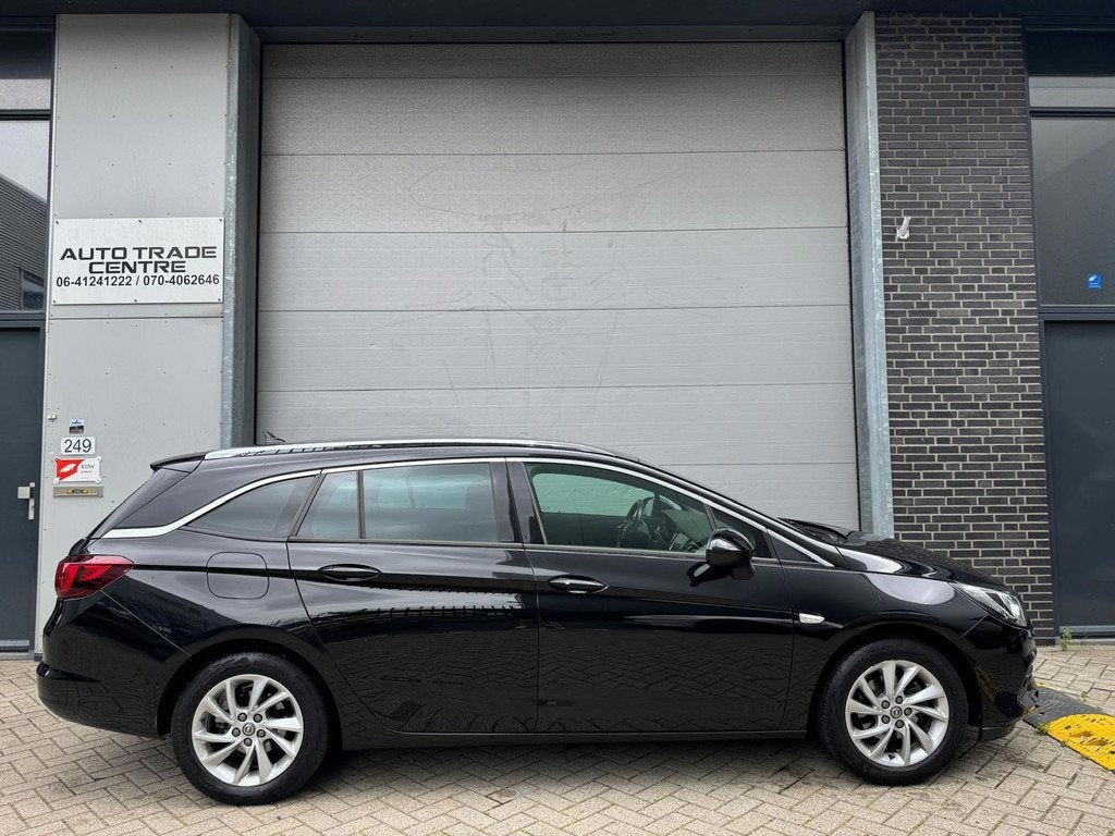 Opel Astra Sports Tourer 1.2 Business Elegance [Virtual | St, Voorwielaandrijving, 1199 cc, Zwart, Origineel Nederlands