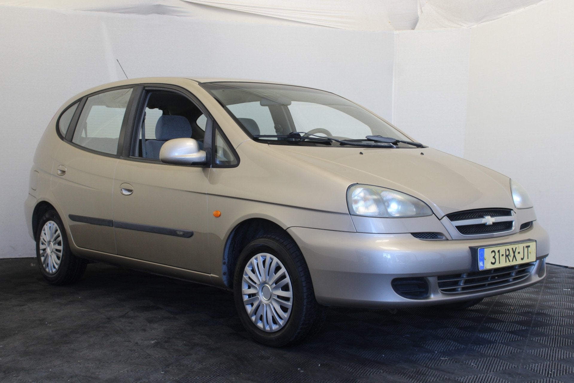 Chevrolet Tacuma 1.6-16V Spirit (bj 2005), Auto's, Chevrolet, Voorwielaandrijving, Stof, Gebruikt, Beige