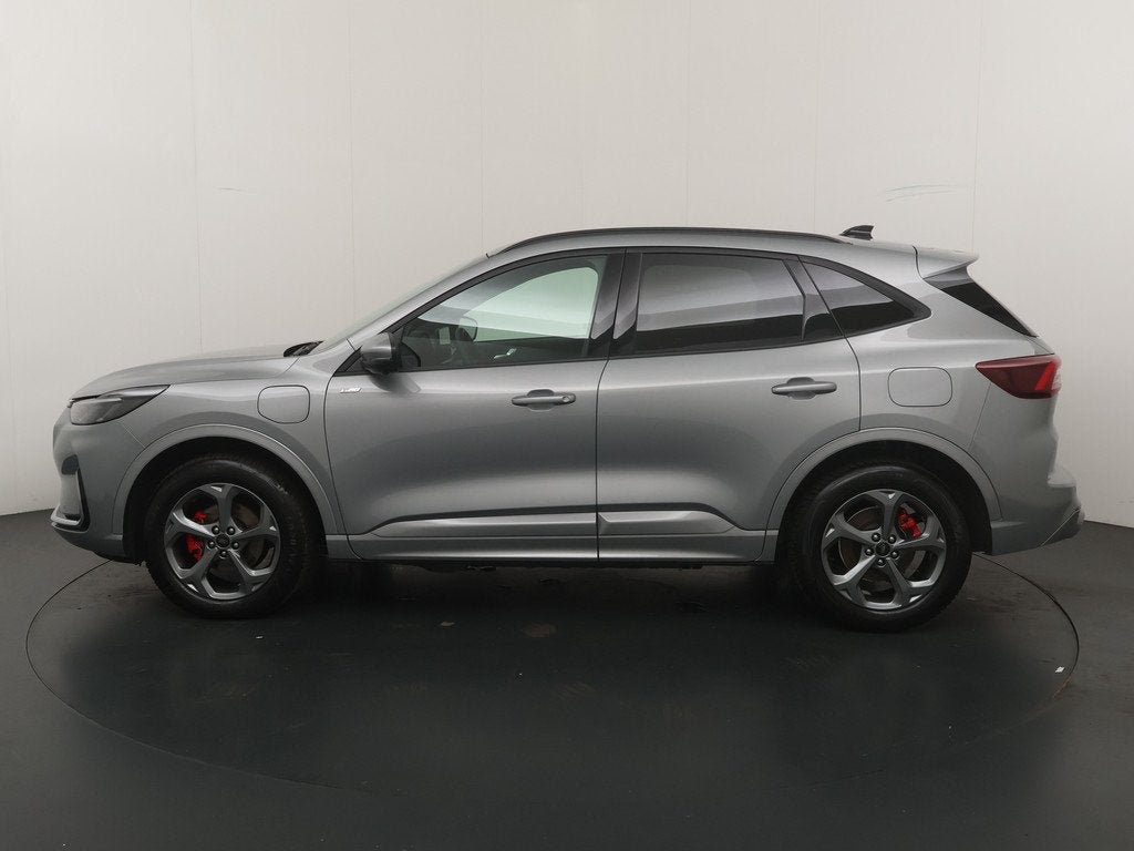 Ford Kuga 2.5 PHEV 243 pk ST-Line X I AGR stoelen | Adapt Cr, Auto's, Ford, 12 maanden, 14 kWh, Gebruikt, Zwart