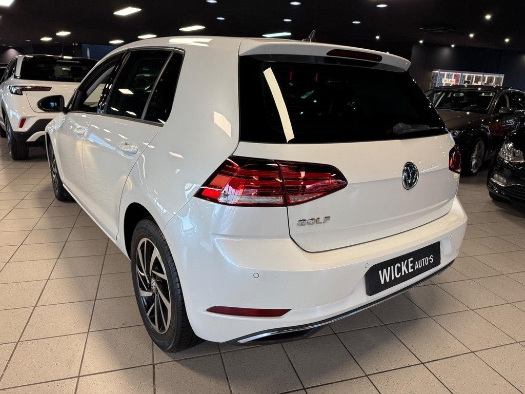 Volkswagen Golf 1.0 TSI Comfortline 85 KW 6 bak Navigatie Cr, Auto's, Stof, Gebruikt, Wit, Bedrijf
