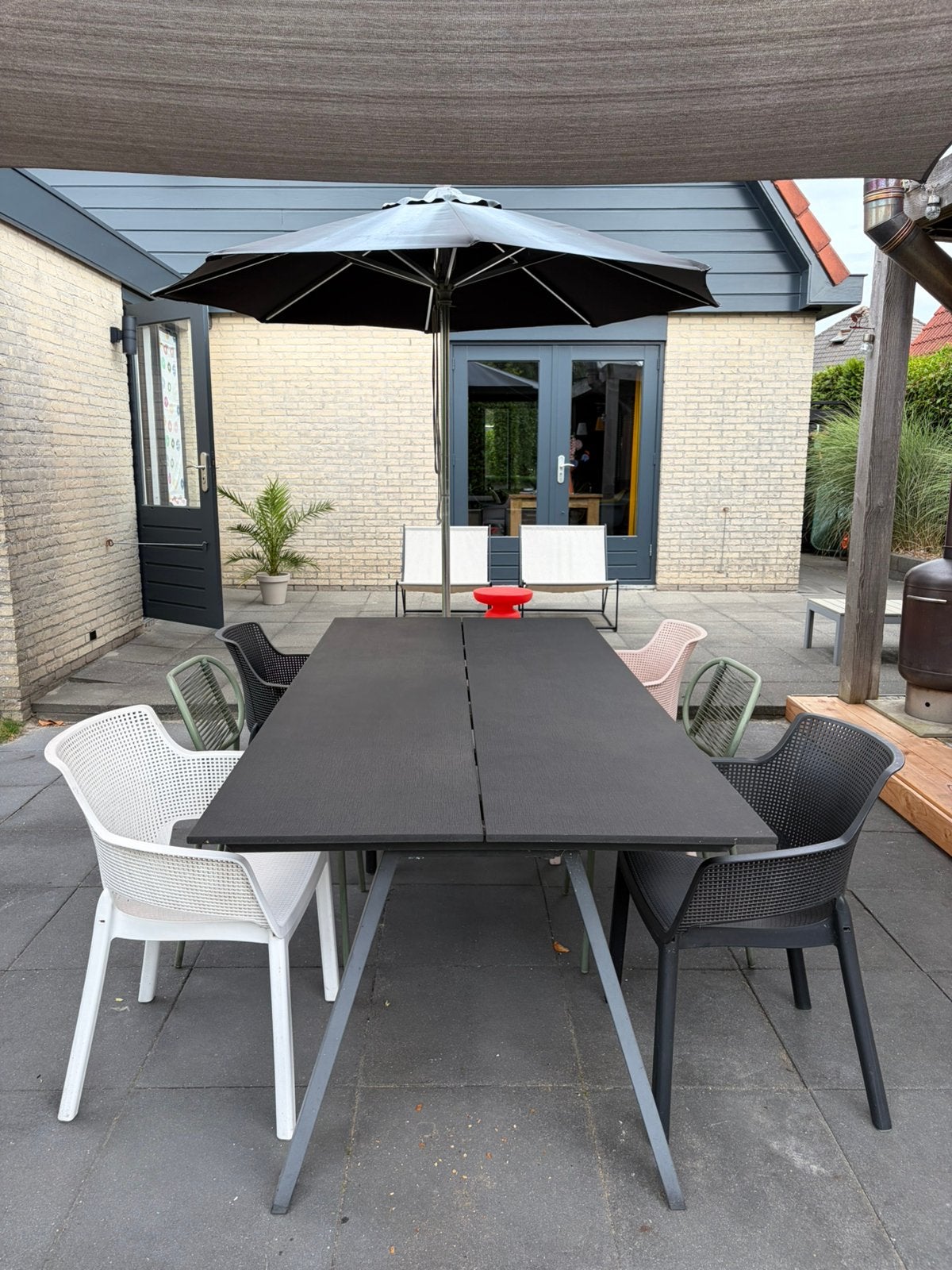 Buitentafel (zwart) met 6 stoelen., Ophalen, Kunststof, Gebruikt, Eettafel