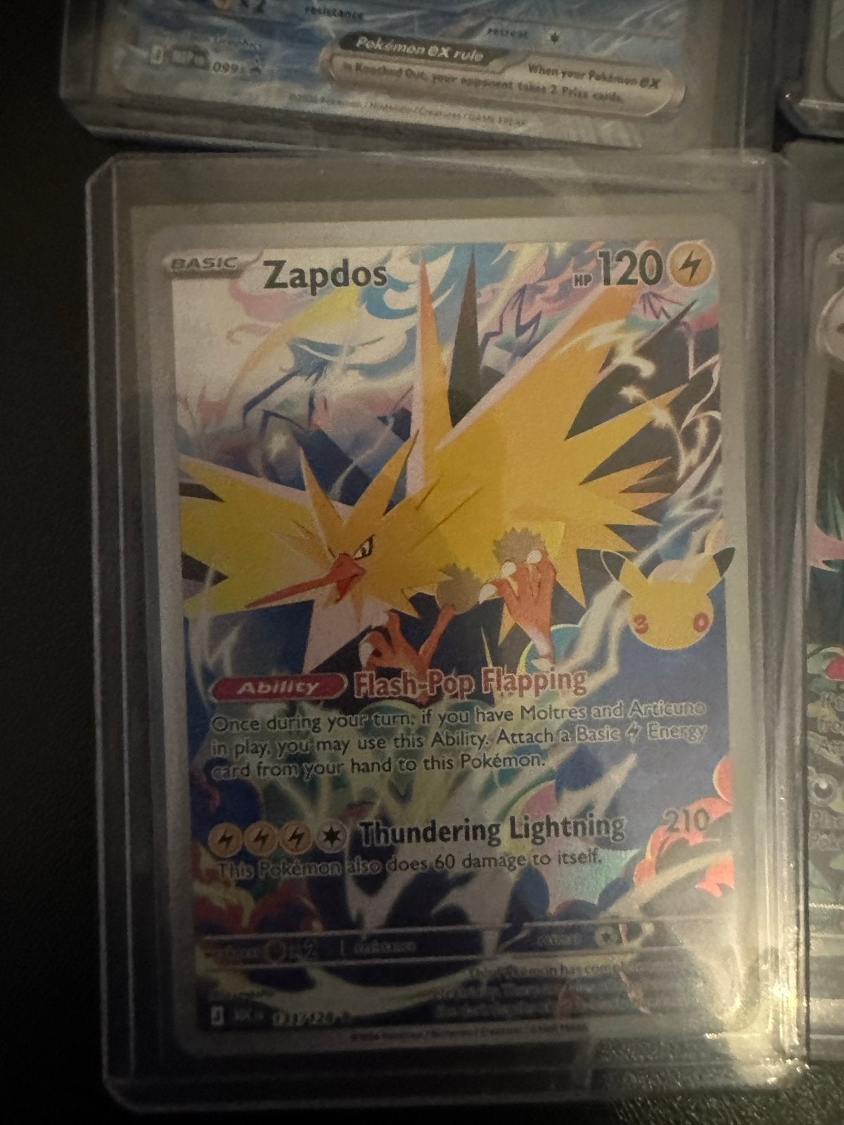 Zapdos 30th Celebrations Full Art Pokémon Kaart, Ophalen of Verzenden, Zo goed als nieuw, Losse kaart
