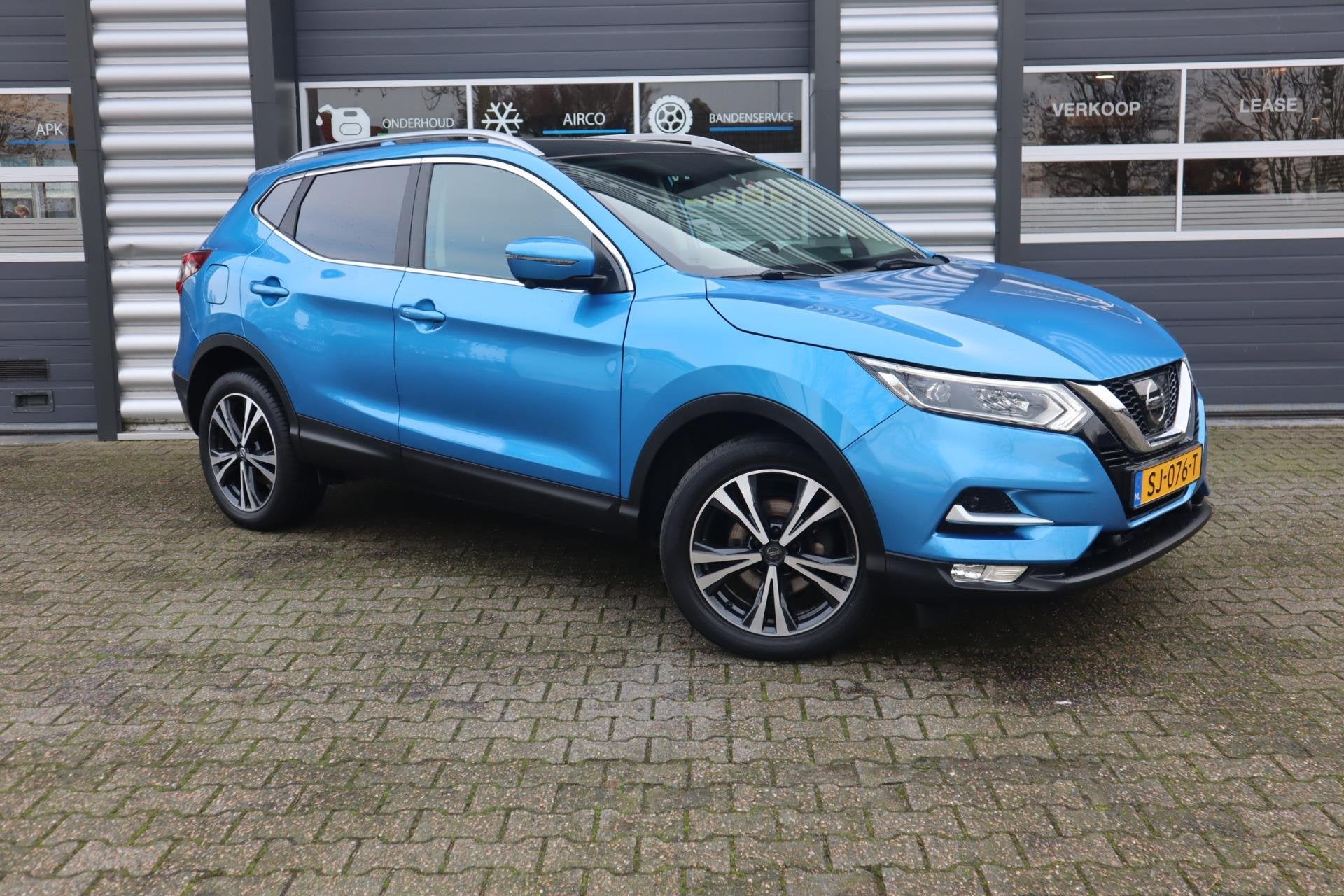 Nissan Qashqai 1.2 Tekna |navi|, Auto's, Gebruikt, Euro 6, 4 cilinders, Blauw