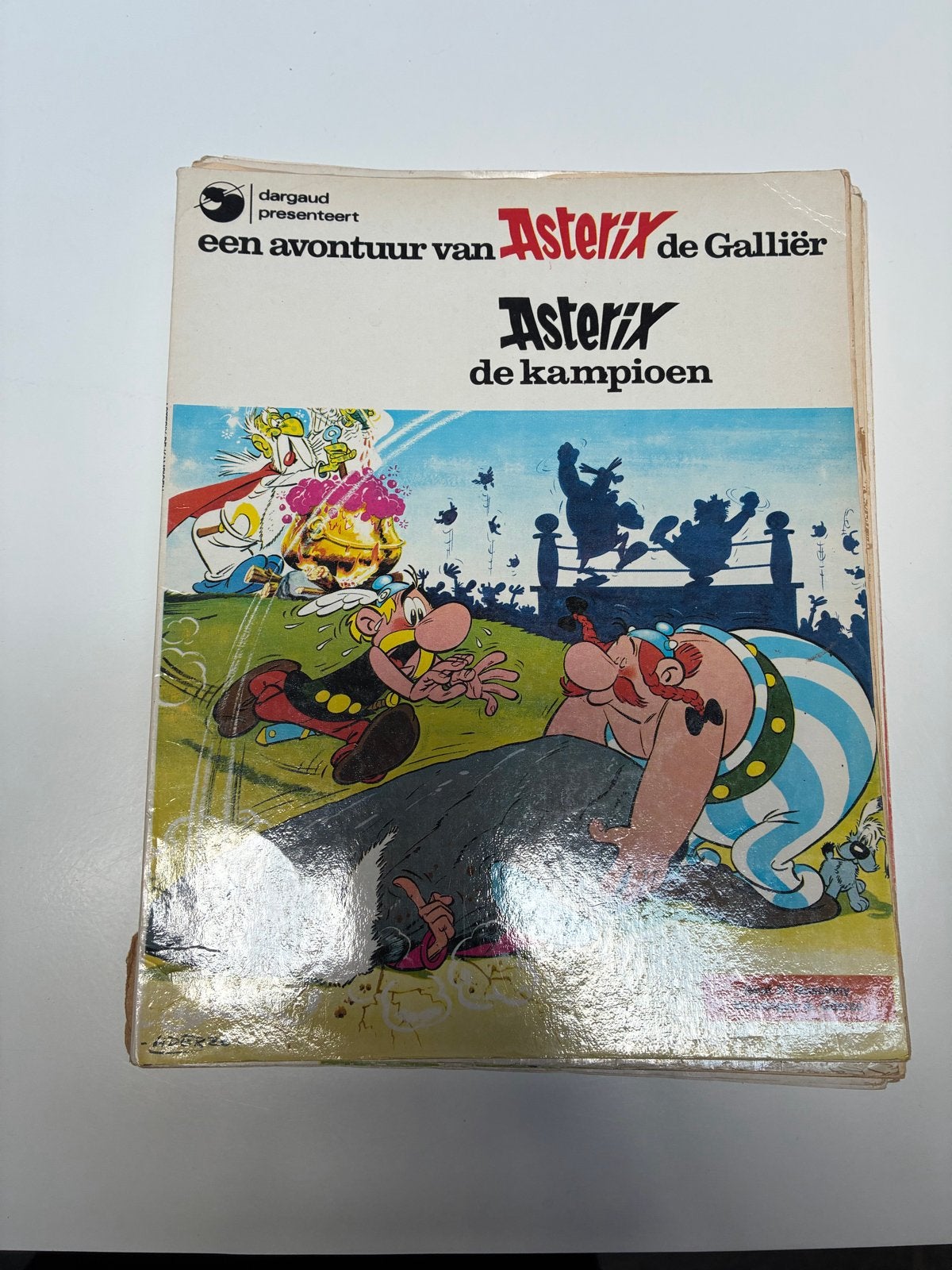 Asterix de Kampioen - Een avontuur van Asterix de Galliër, Boeken, Stripboeken, Eén stripboek, Ophalen of Verzenden, Gelezen