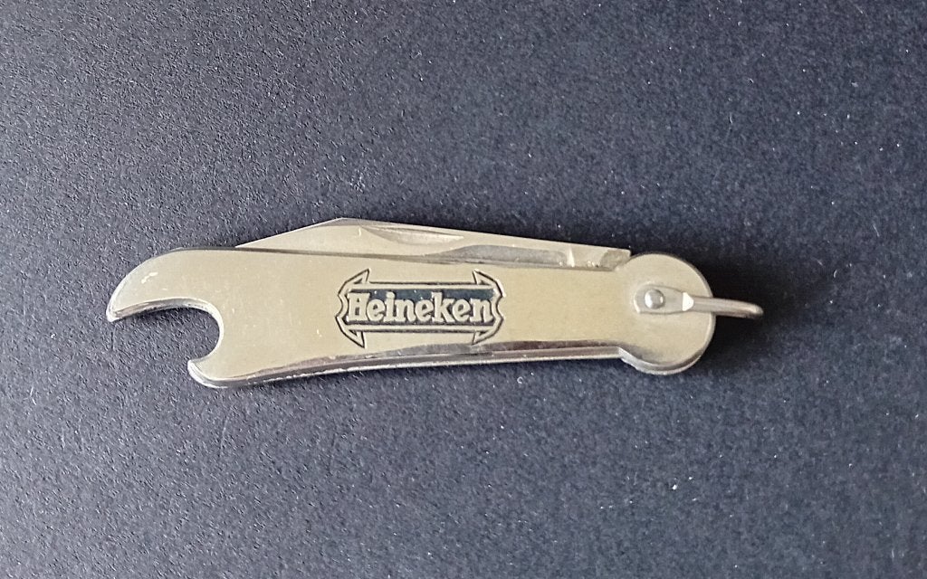 Zakmesje 'Heineken' met kroonkurkdop-opener, Ophalen of Verzenden, Zo goed als nieuw, Flesopener, Heineken