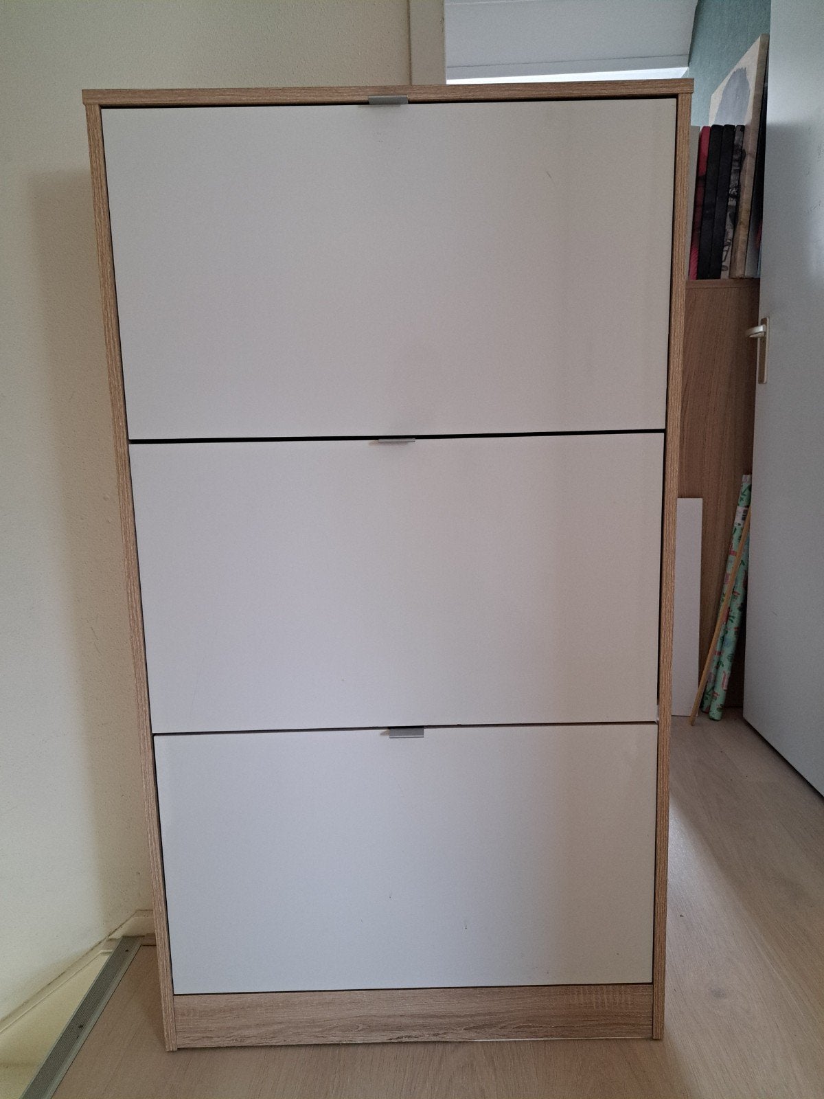 schoenenkast, Ophalen