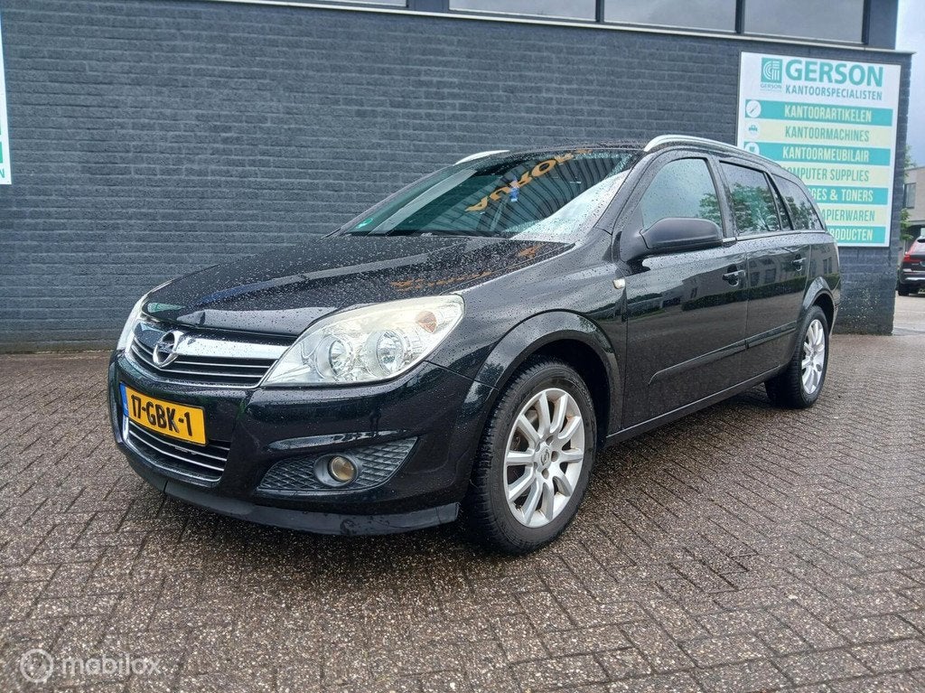 Opel Astra Wagon 1.4 Cosmo/Dealer onderhouden/Apk 04-'27, Auto's, Opel, Voorwielaandrijving, 639 kg, Gebruikt, Zwart