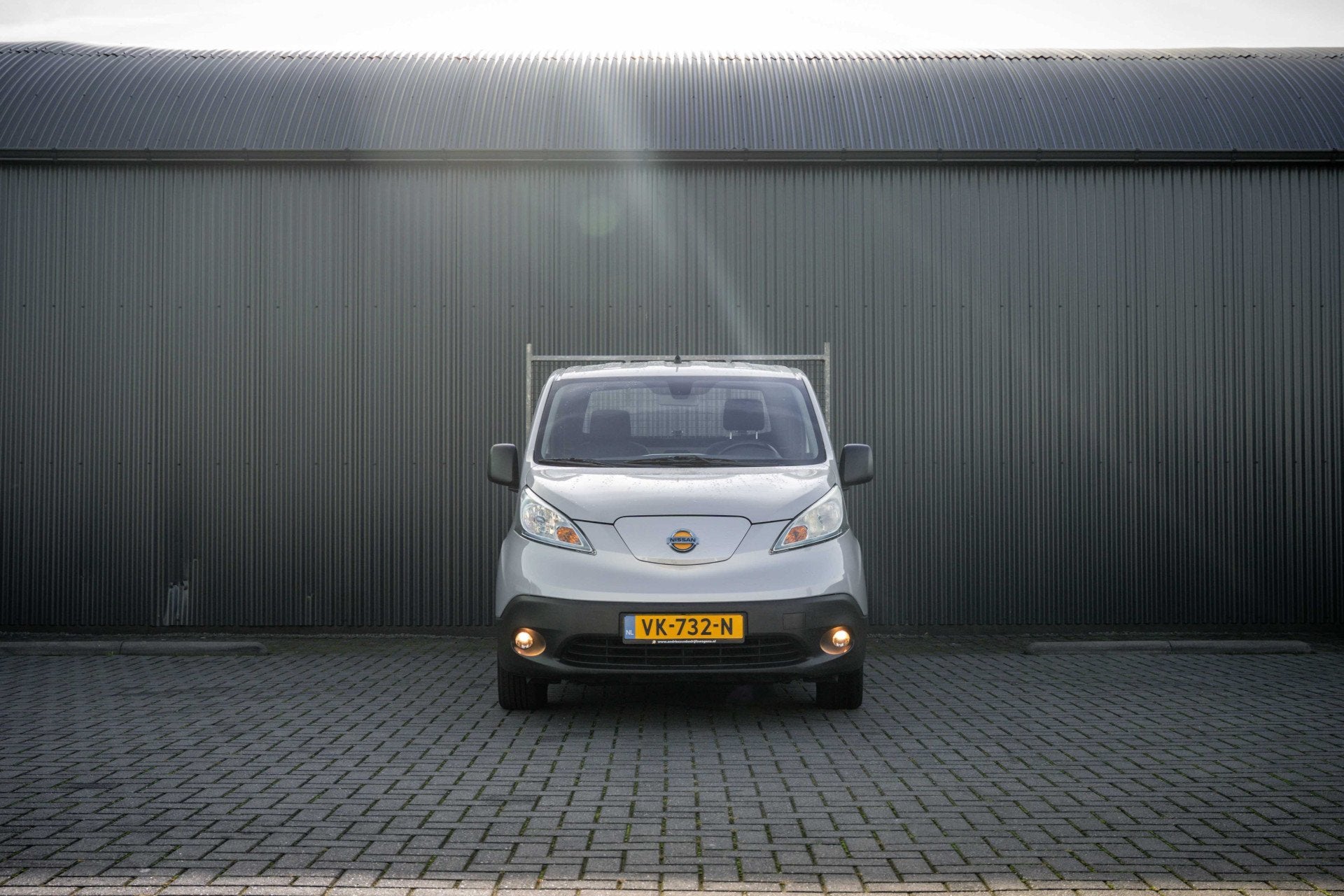 Nissan e-NV200 | Kipper | Volledig elektrisch | Camera | Nav, Auto's, Stof, Gebruikt, Zwart, 1719 kg