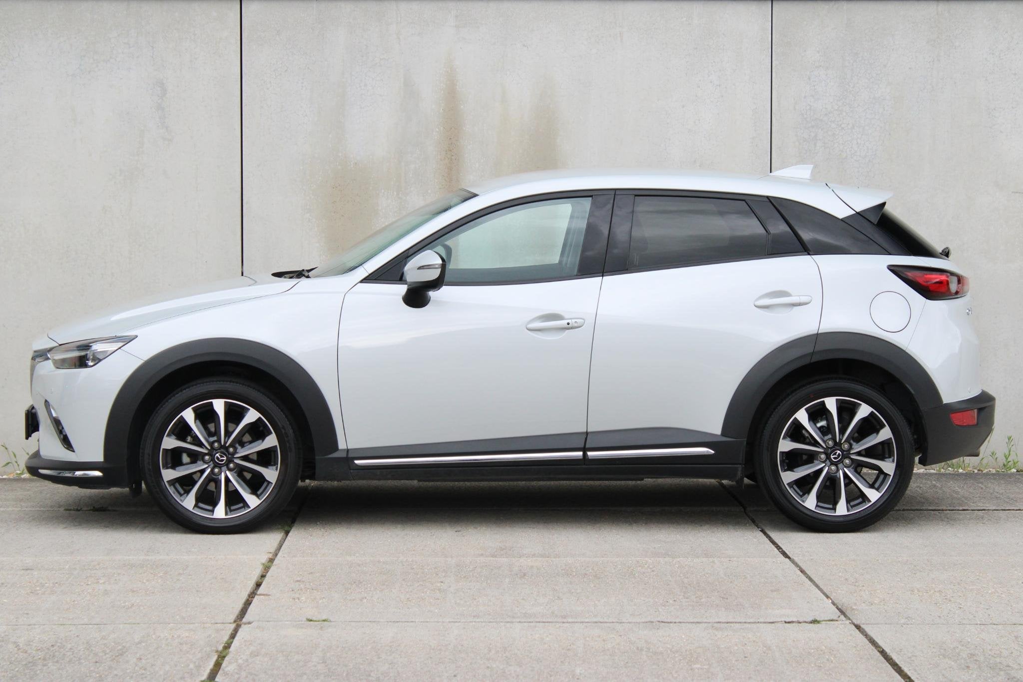 Mazda CX-3 2.0 SkyActiv-G 121 Luxury / AUTOMAAT / APPLE ANDR, 1998 cc, 4 cilinders, Met garantie (alle), Leder en Stof