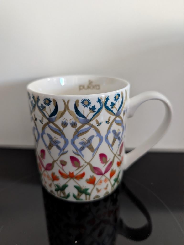 Puka beker, Huis en Inrichting, Keuken | Servies, Ophalen of Verzenden, Zo goed als nieuw, Overige stijlen, Kop(pen) en/of Schotel(s)