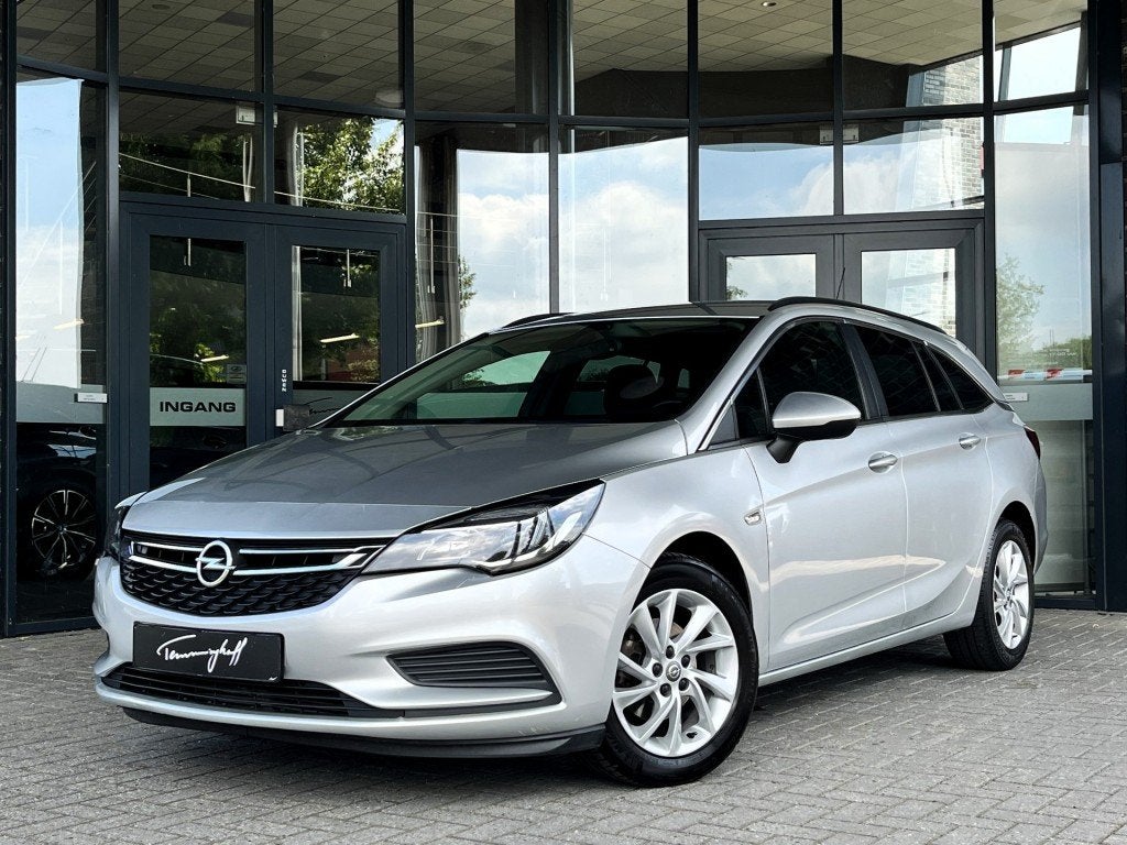Opel ASTRA SPORTS TOURER 1.0 T. BUSINESS NAVI - CRUISE - TRE, Auto's, Gebruikt, Euro 6, 1178 kg, 620 kg