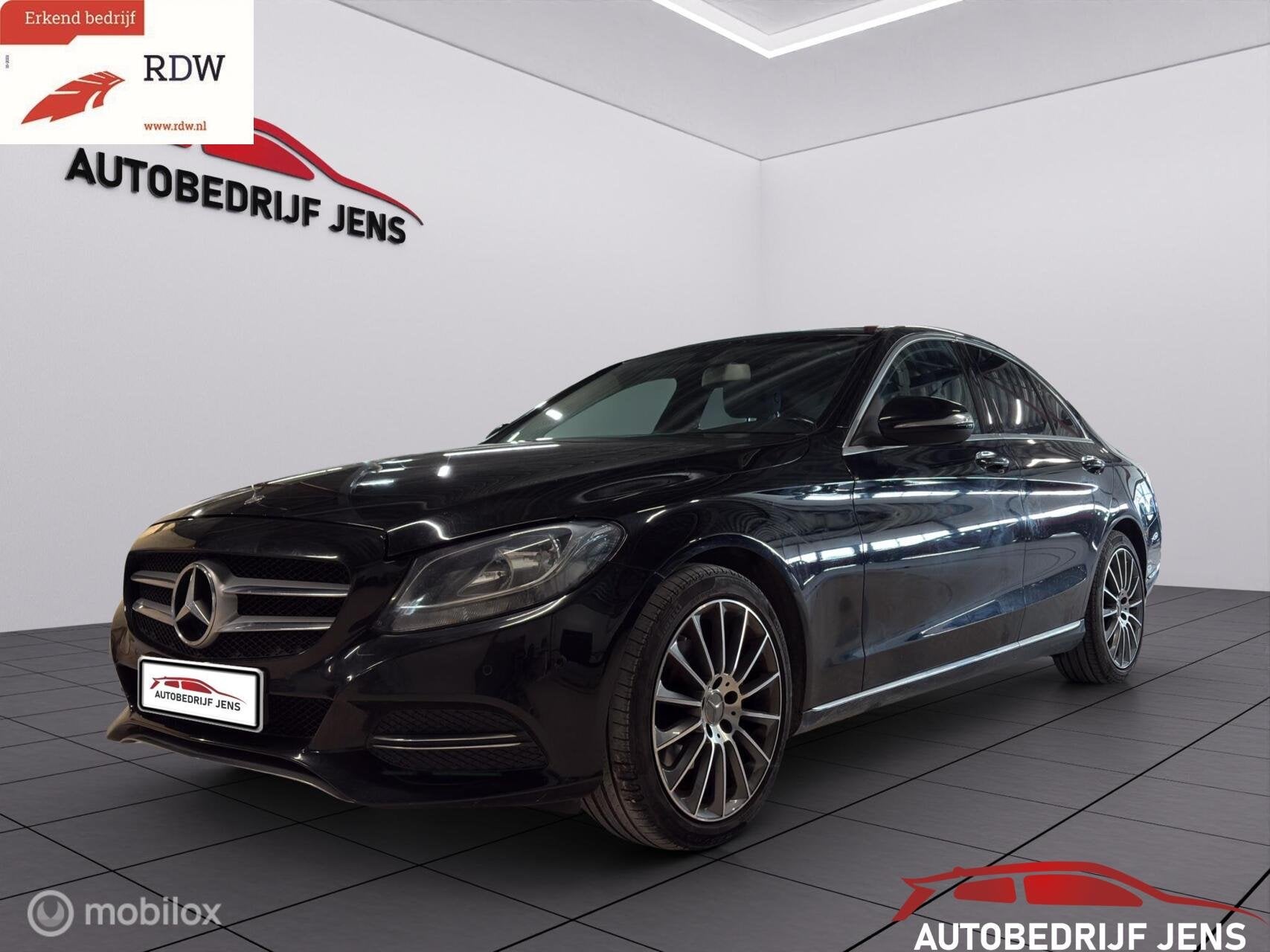 Mercedes C-klasse 200 Prestige, Auto's, Achterwielaandrijving, Gebruikt, Euro 6, Zwart