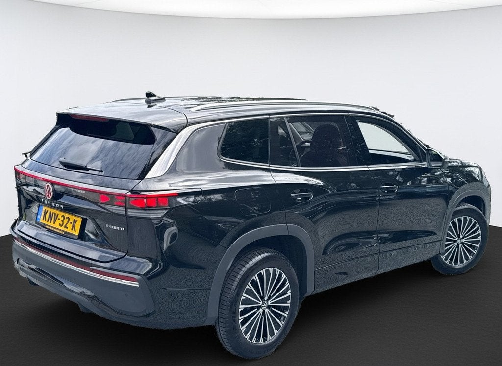 Volkswagen Tayron 1.5 eHybrid PHEV 204PK ELEGANCE 360°CAMER, Auto's, Volkswagen, 12 maanden, 4 cilinders, Leder en Stof, Zwart