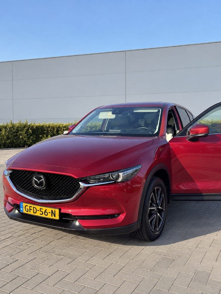 Mazda CX-5 2.5 Skyactiv-g 194pk 4WD Aut 2017 Rood, Auto's, Automaat, 4 cilinders, 2000 kg, Overige kleuren