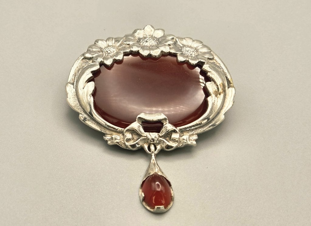 Antieke zilveren bloem broche/hanger met carneool. 2026/535, Ophalen of Verzenden, Zilver, Broche, Met edelsteen