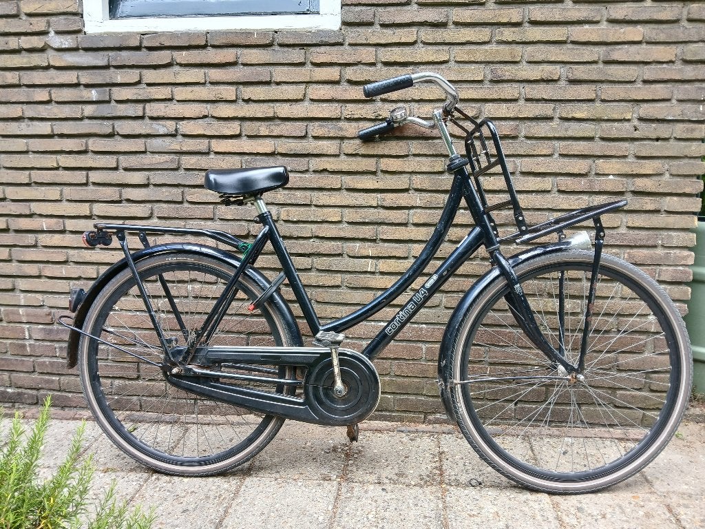 Damesfiets Cortina U4 28 inch zwart met transportrek, Fietsen en Brommers, Fietsen | Dames | Damesfietsen, Terugtraprem, Gebruikt