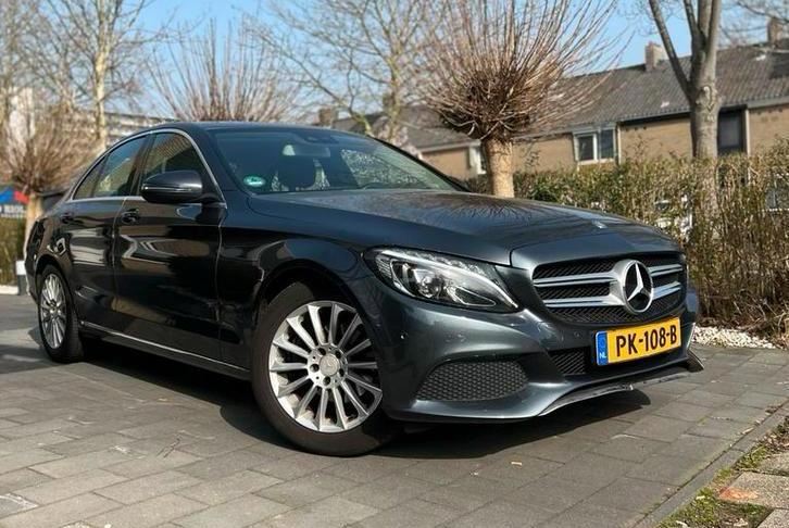 Mercedes-Benz C-Klasse C180 1.6 115KW Aut7 2016 Grijs, Auto's, Automaat, 1800 kg, Zwart, Leder en Stof